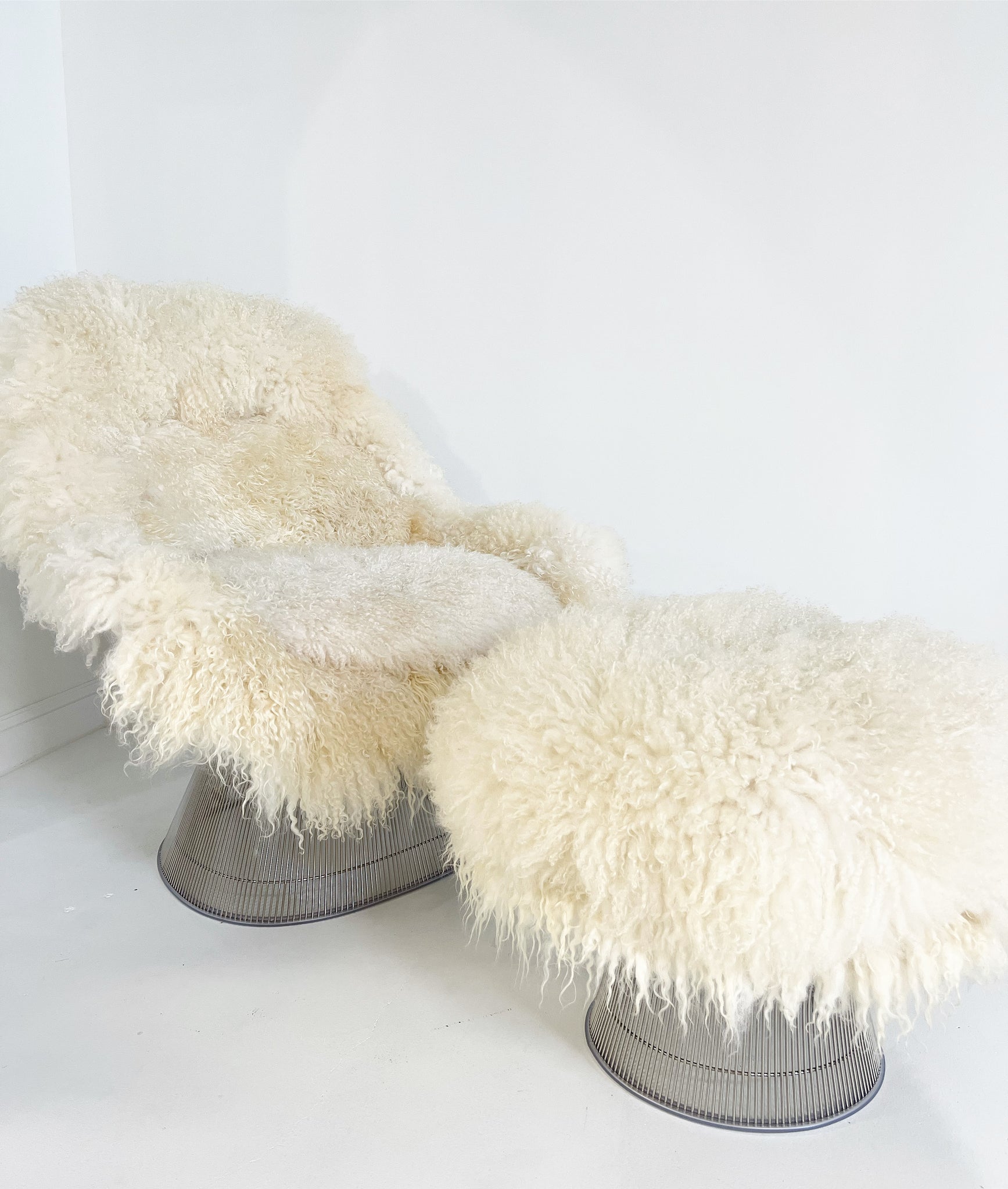 ON HOLD Easy Chair and Ottoman in Gotland Sheepskin and Leather