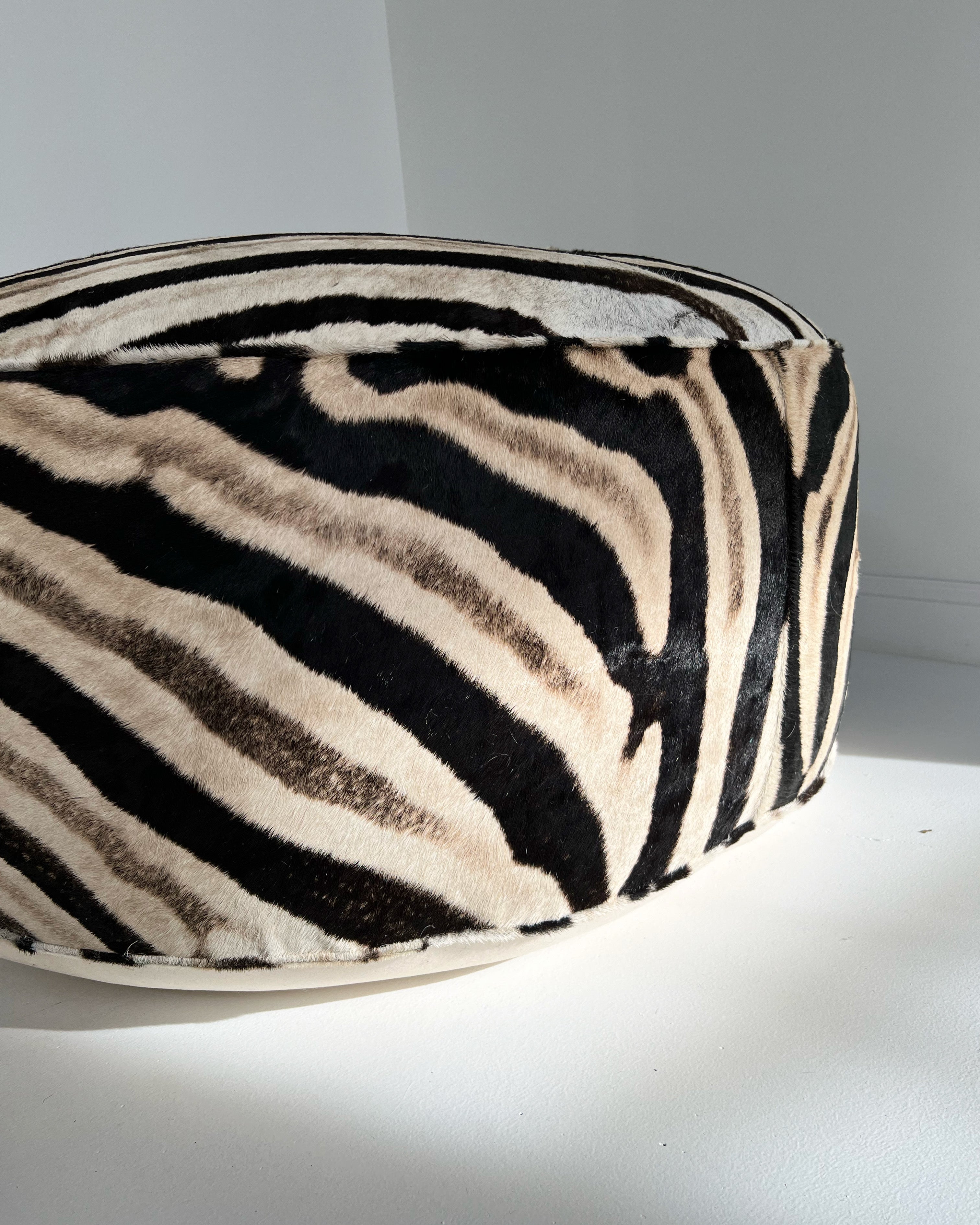 The Forsyth Cloud Ottoman in Zebra Hide