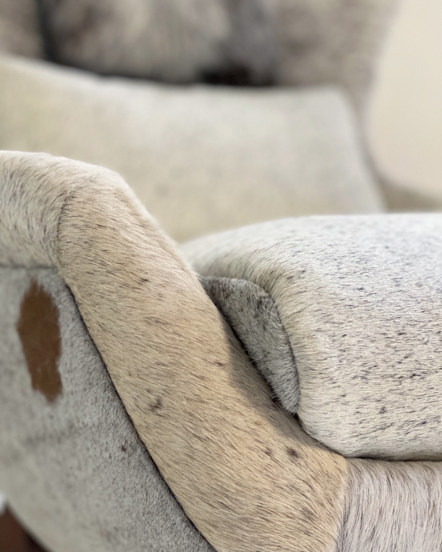 Wingback Lounge Chairs in Brazilian Cowhide, pair