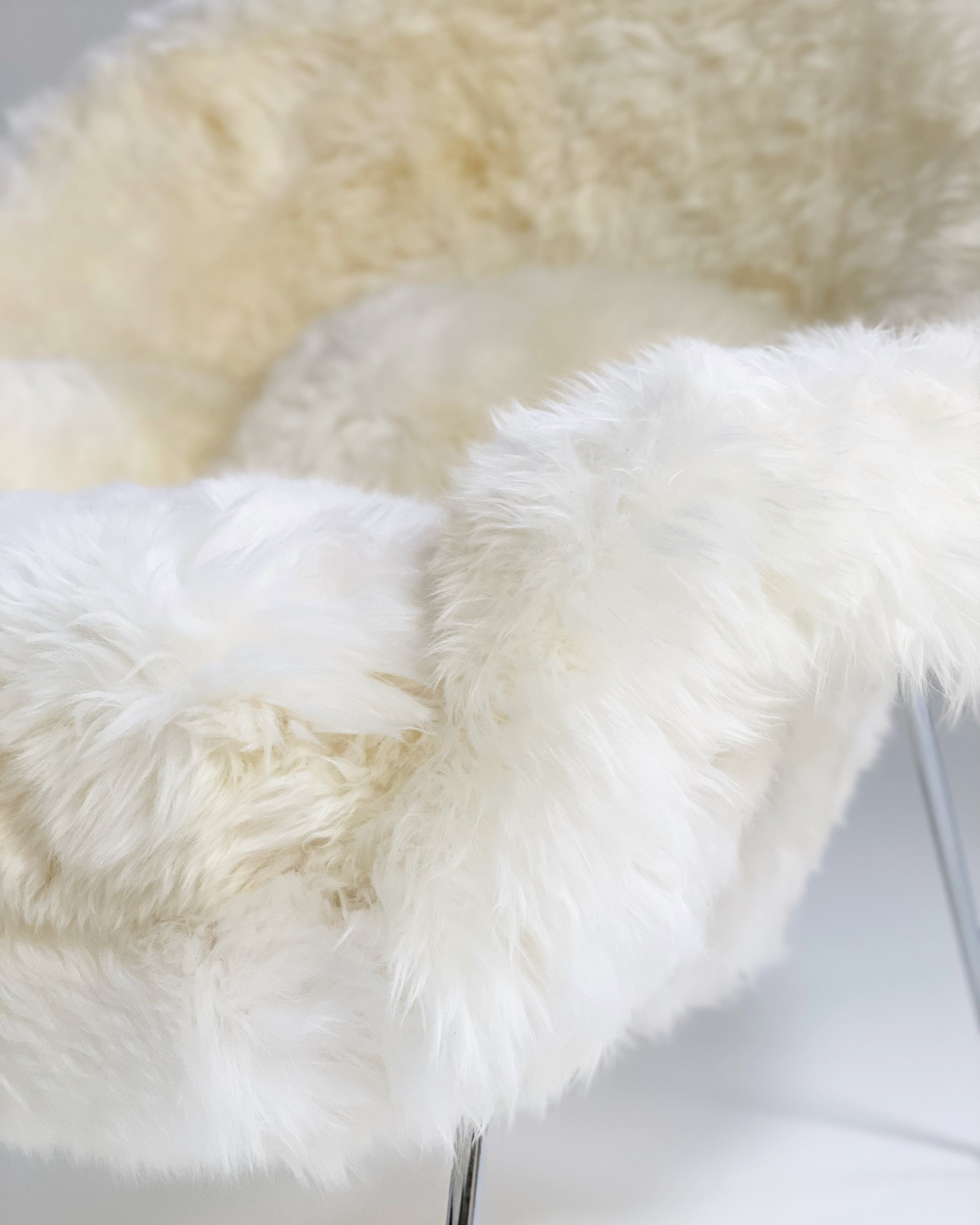 Bespoke Womb Chair and Ottoman in New Zealand Sheepskin