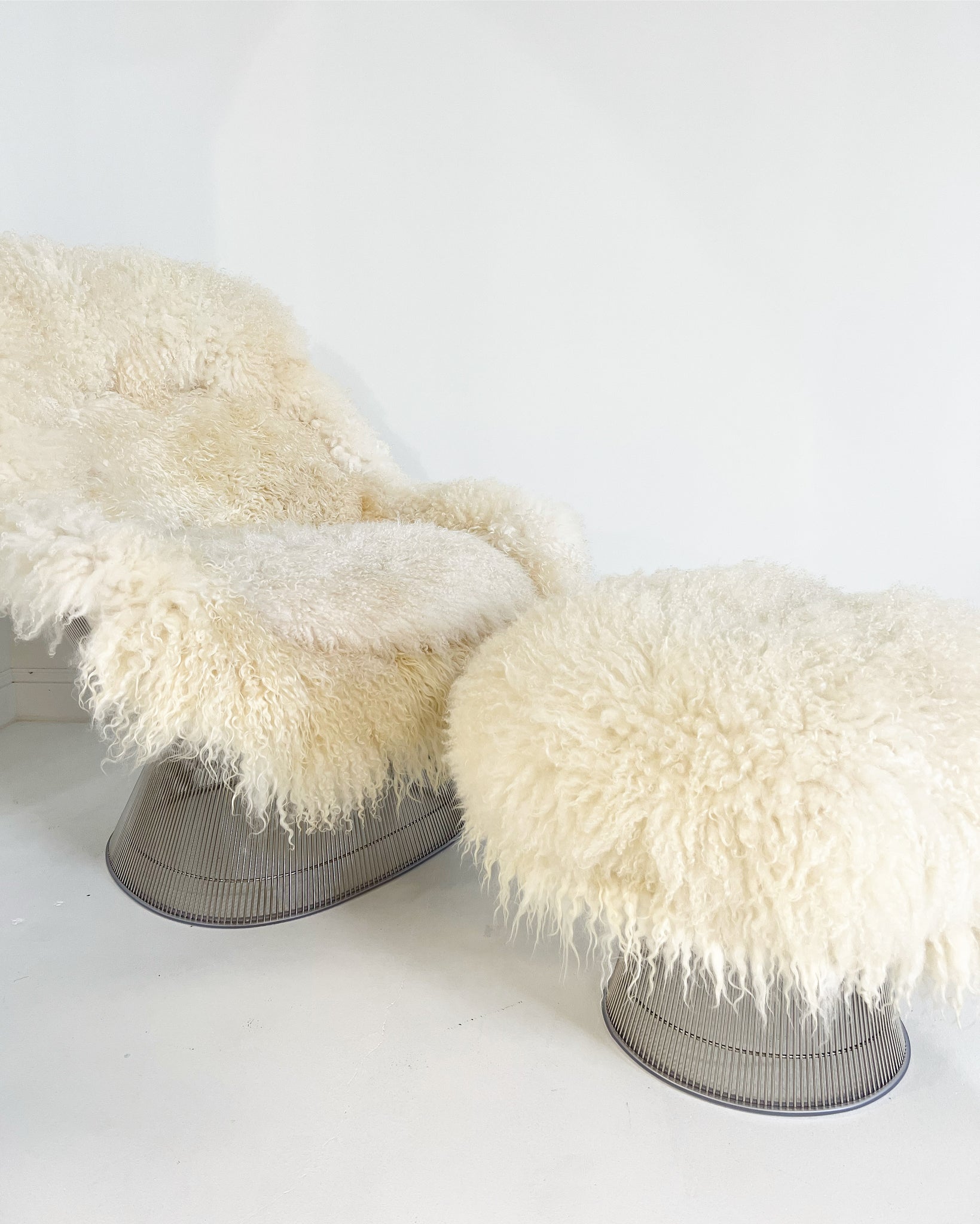 ON HOLD Easy Chair and Ottoman in Gotland Sheepskin and Leather