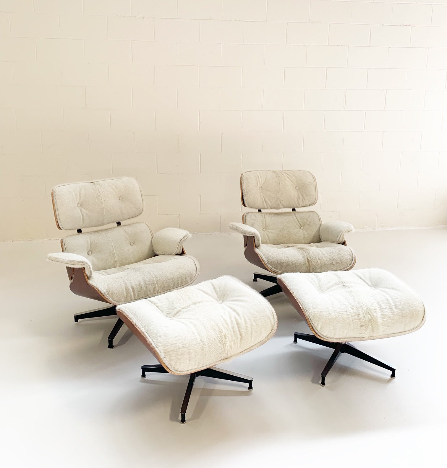 670 Lounge Chairs and 671 Ottomans in Brazilian Cowhide - FORSYTH