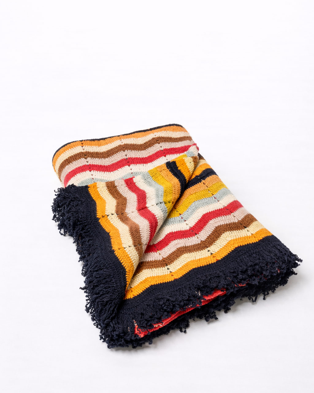 The Ondulee Handknit Cashmere Throw