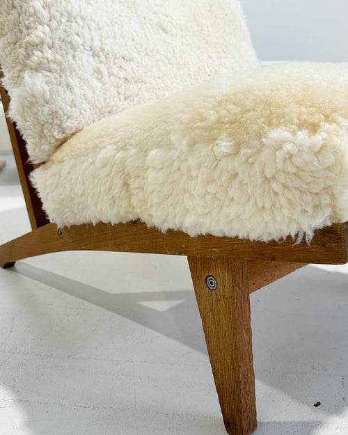 Model GE 375 Lounge Chair in California Sheepskin, One Available