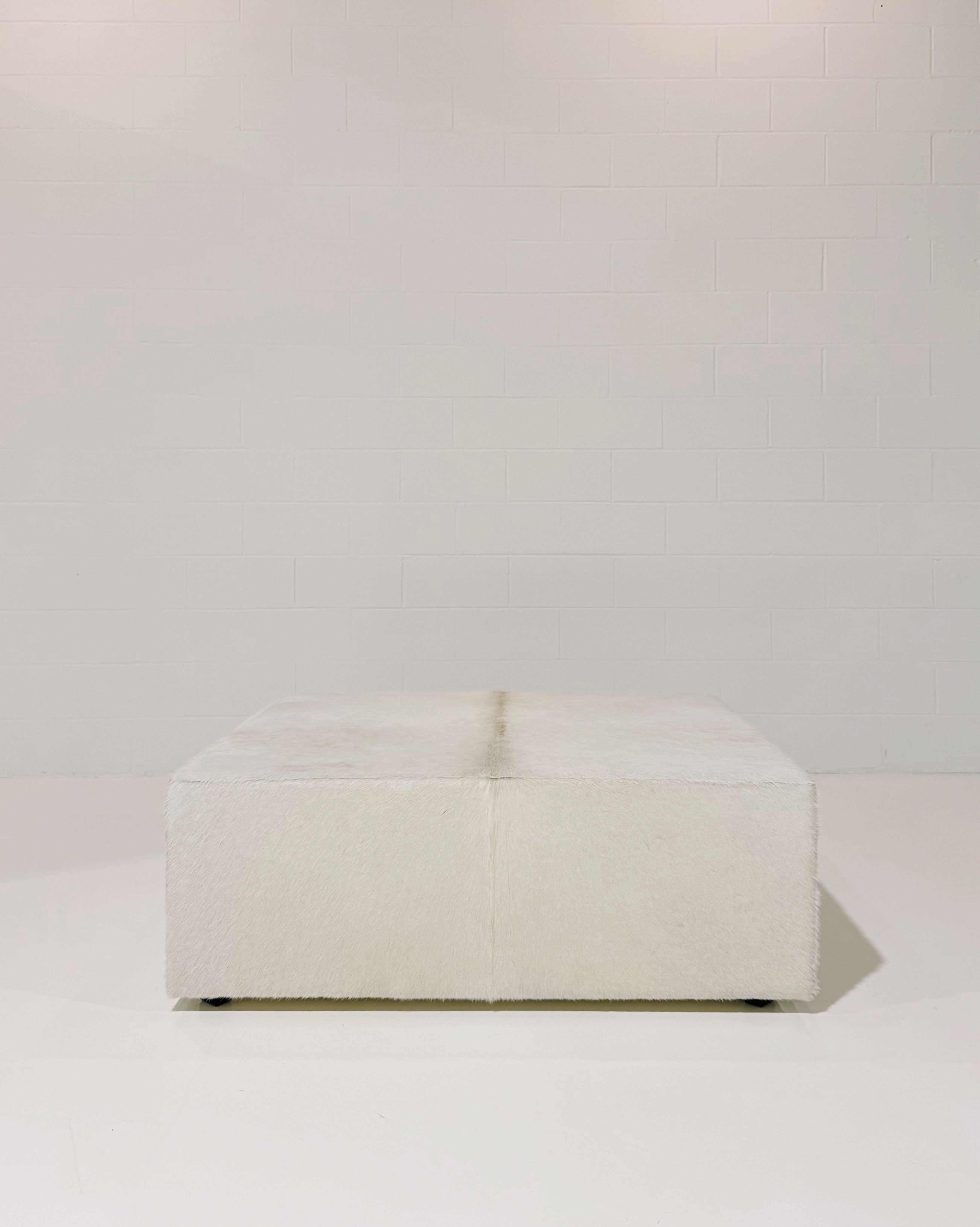 The Forsyth Large Ottoman in Cowhide