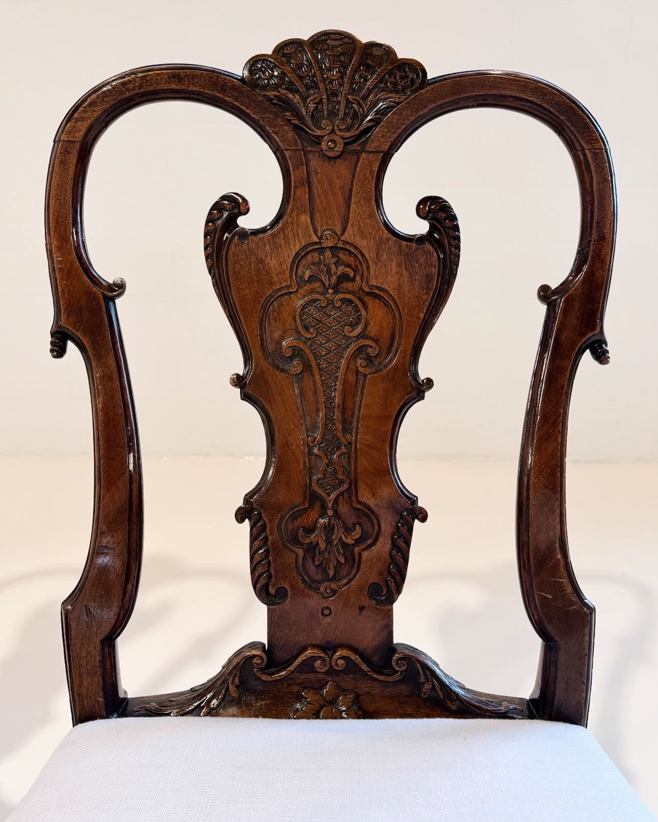 A Fine Pair of George II Walnut Side Chairs