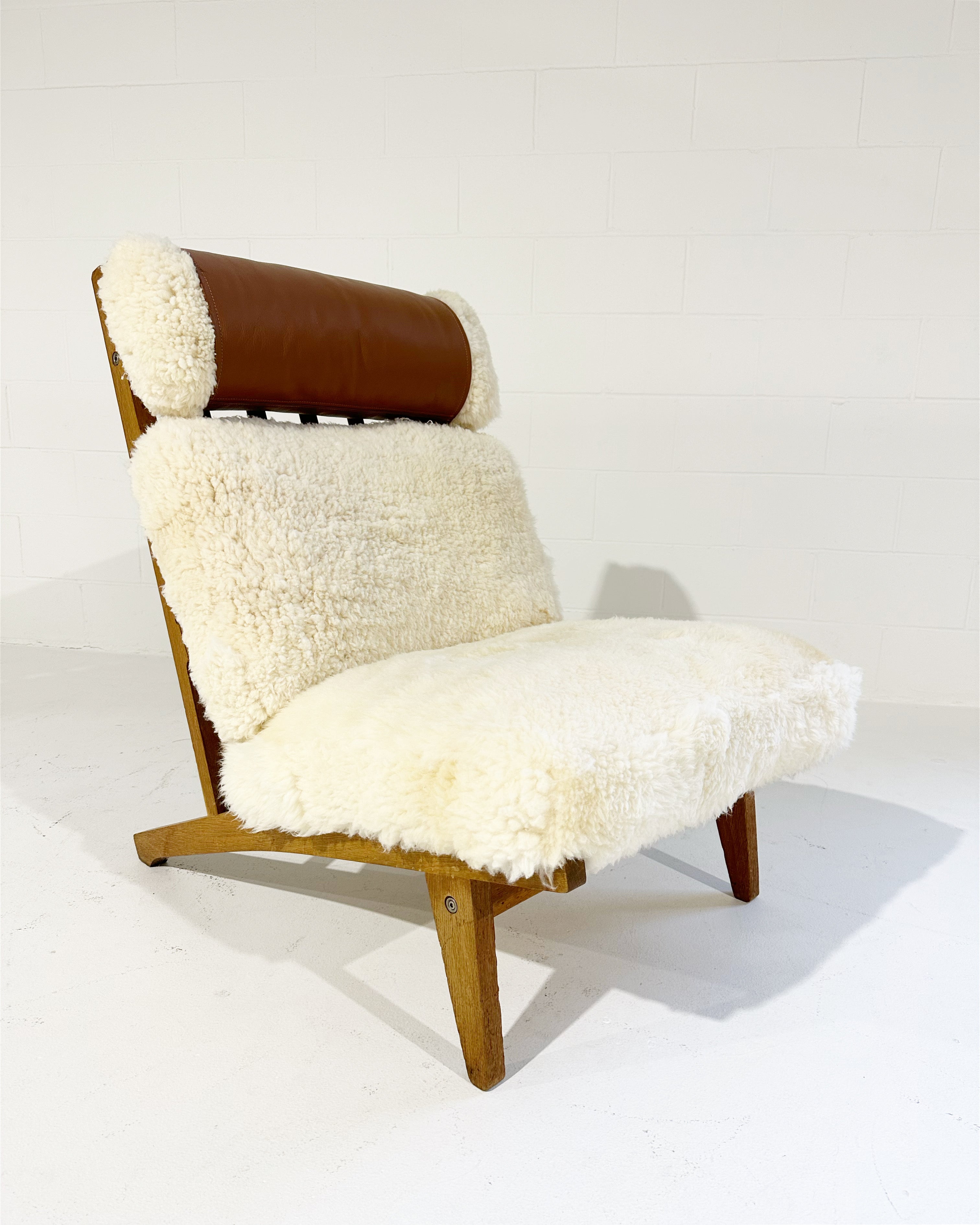 Model GE 375 Lounge Chair in California Sheepskin