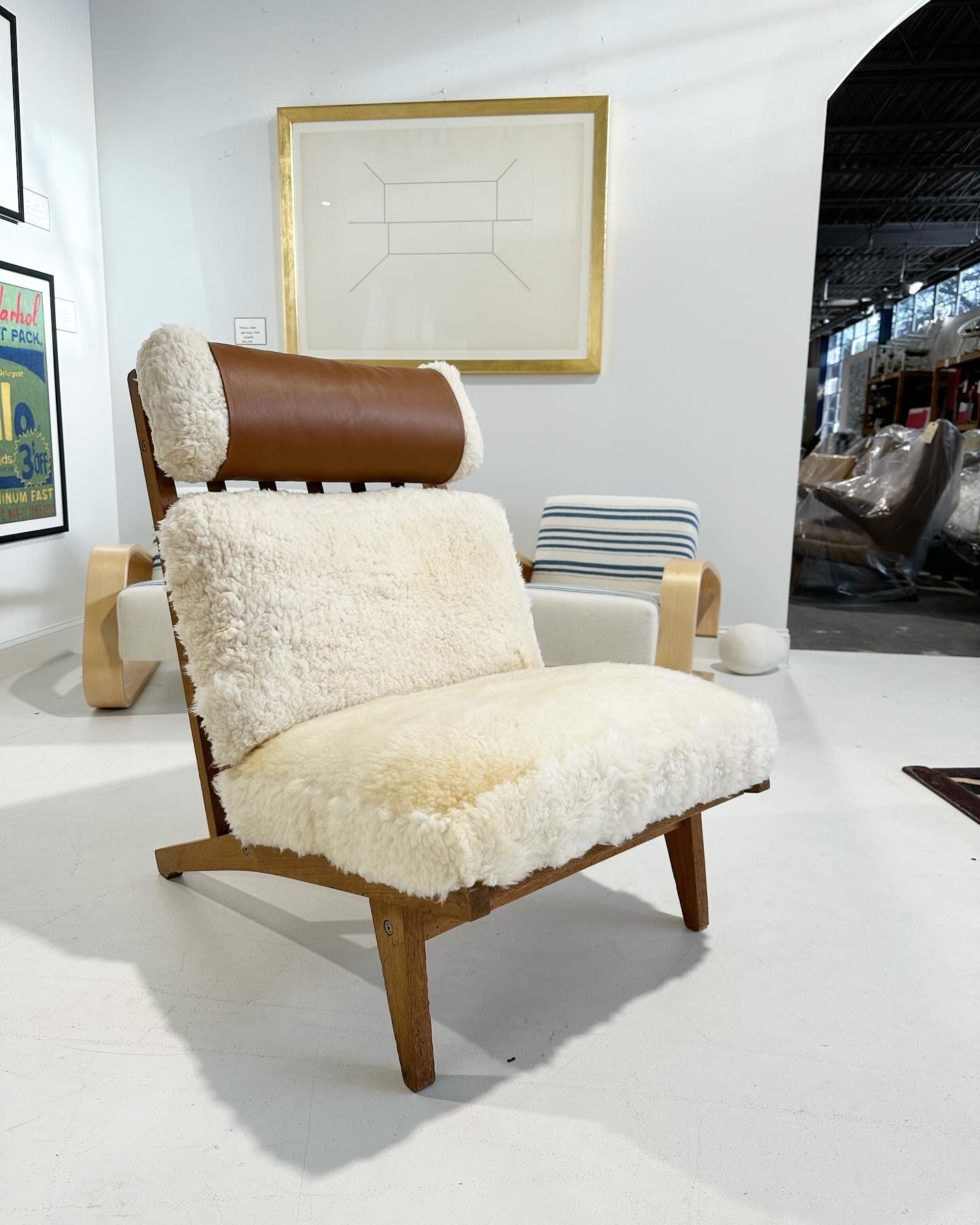 Model GE 375 Lounge Chair in California Sheepskin