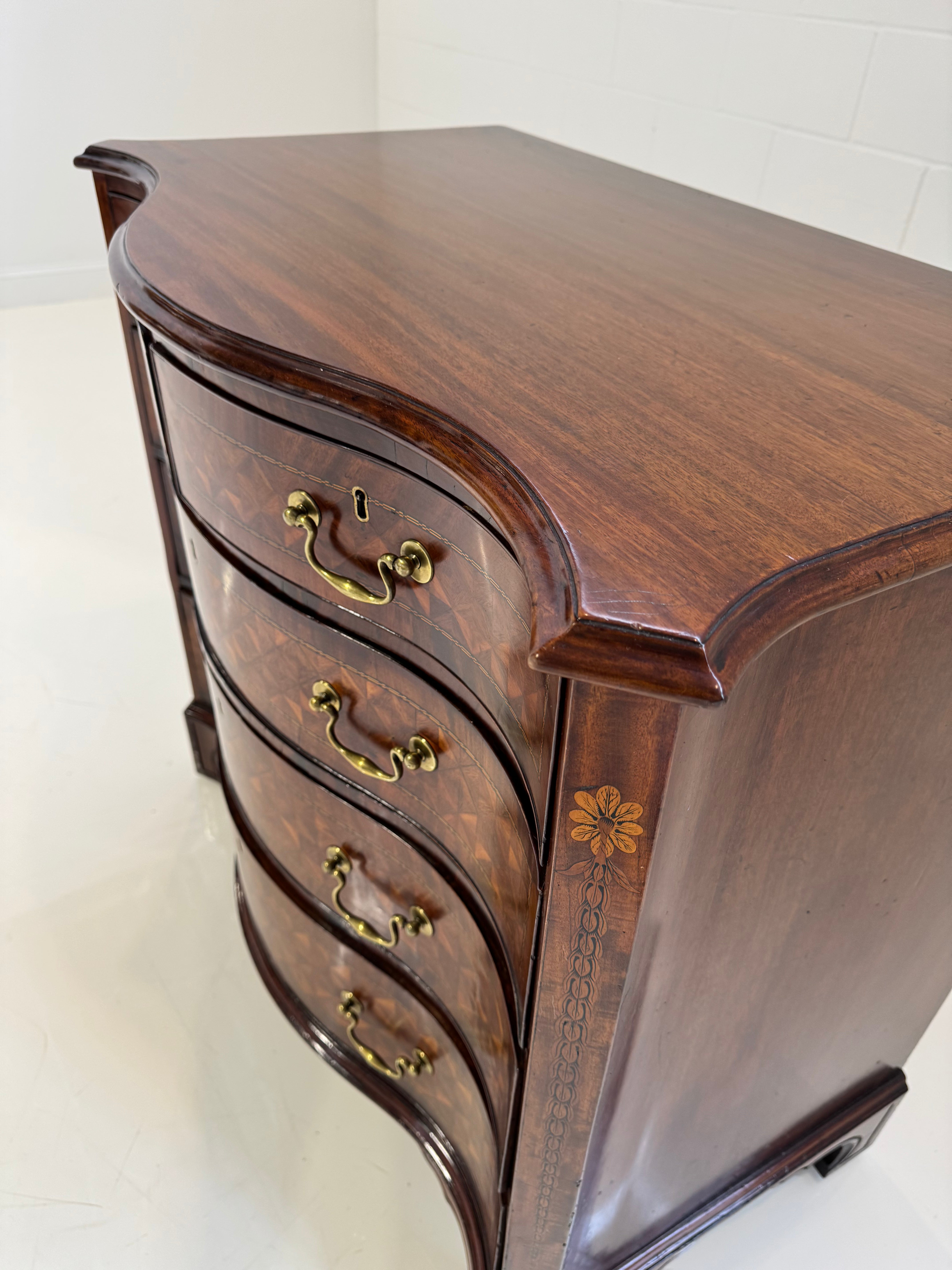 ON HOLD A George III Style Mahogany and Marquetry Chest of Drawers