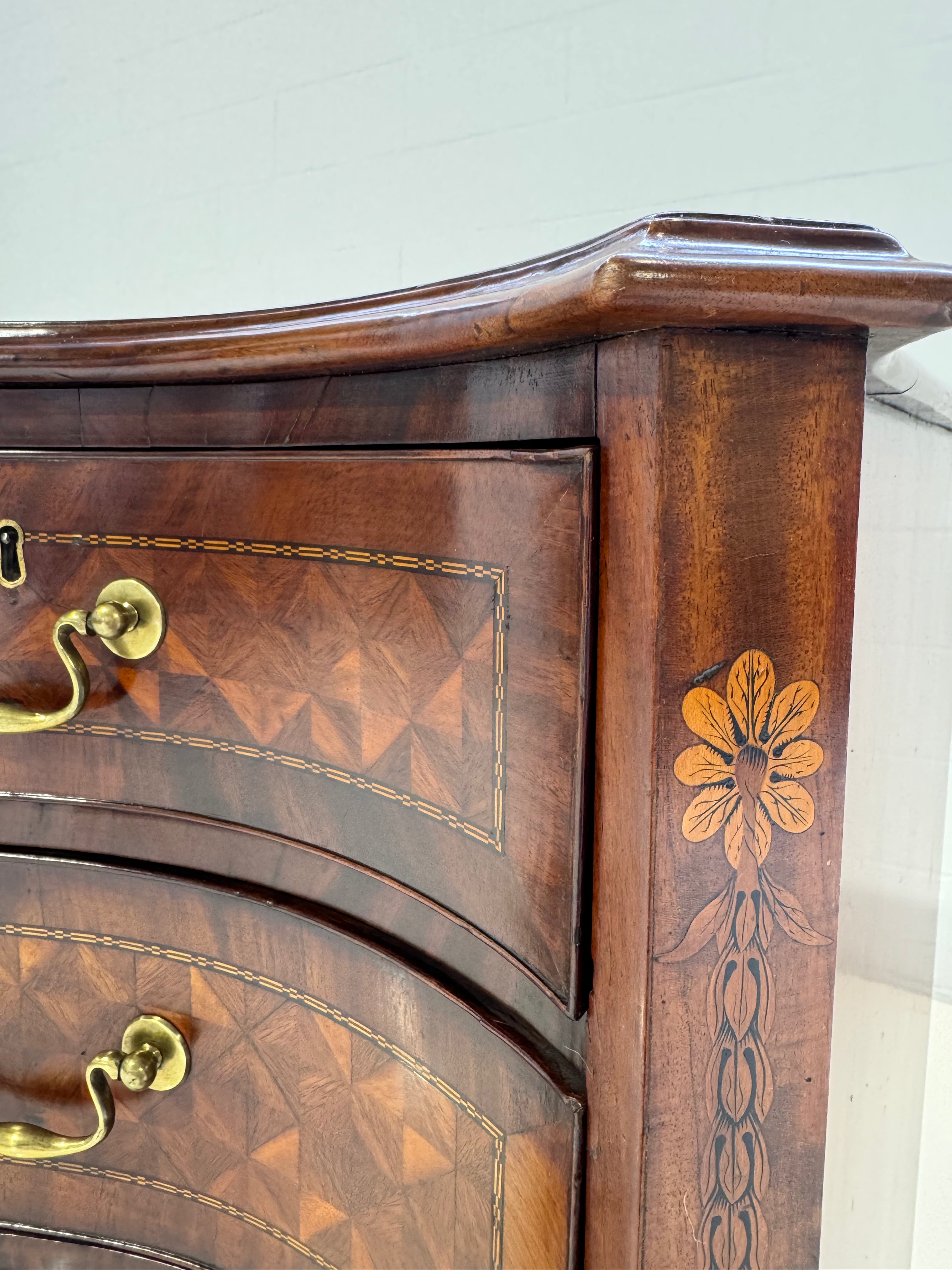 ON HOLD A George III Style Mahogany and Marquetry Chest of Drawers
