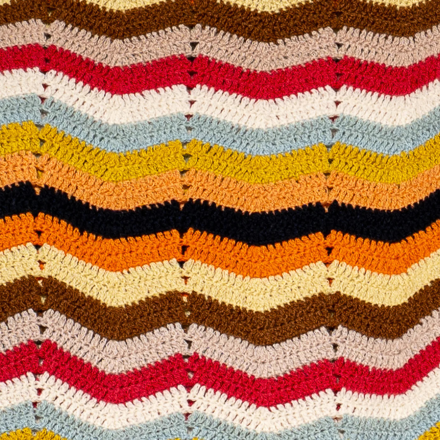 The Ondulee Handknit Cashmere Throw