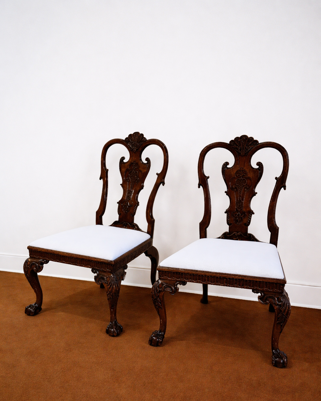 A Fine Pair of George II Walnut Side Chairs