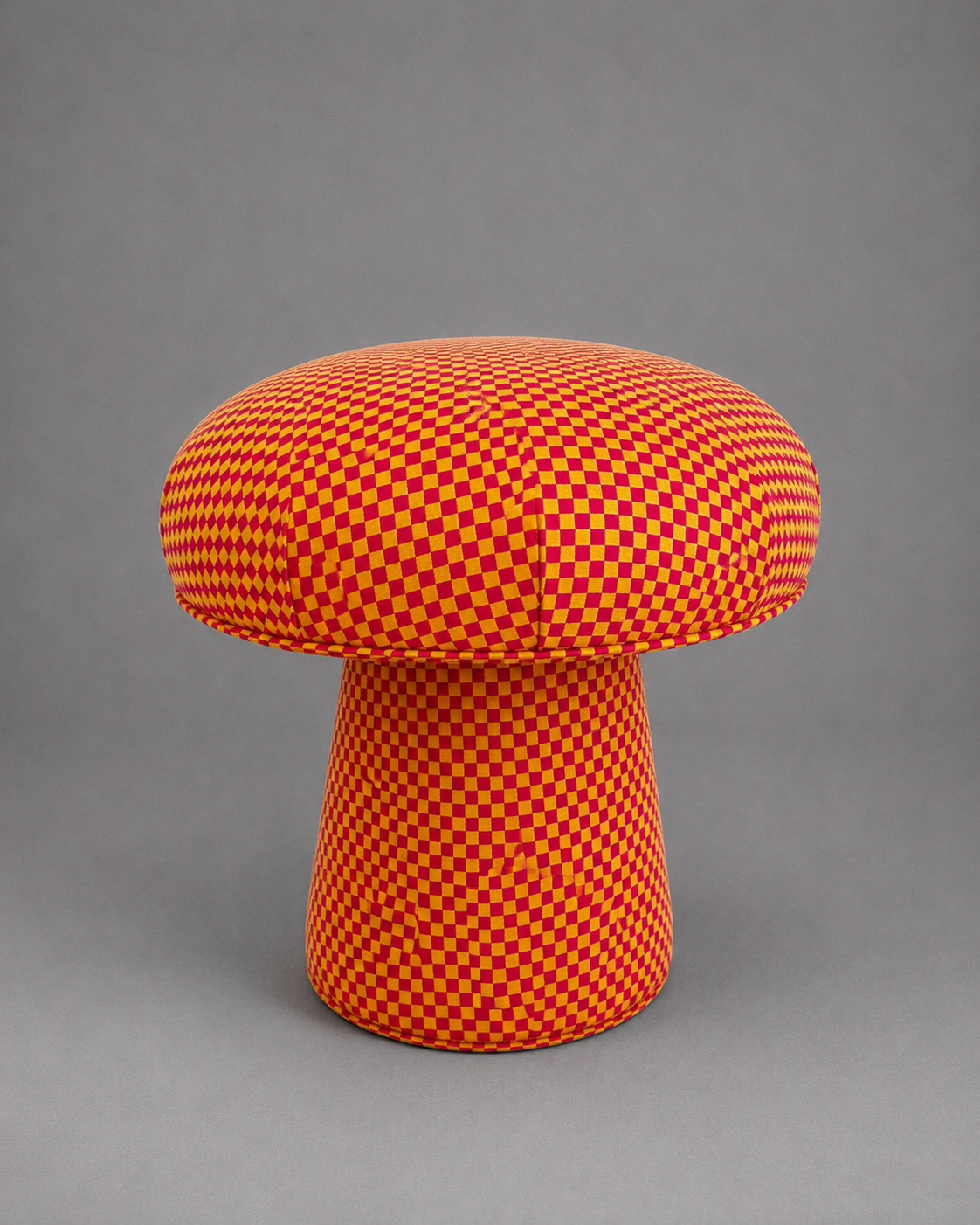 The Forsyth Mushroom Pouf in Maharam Checker by Alexander Girard