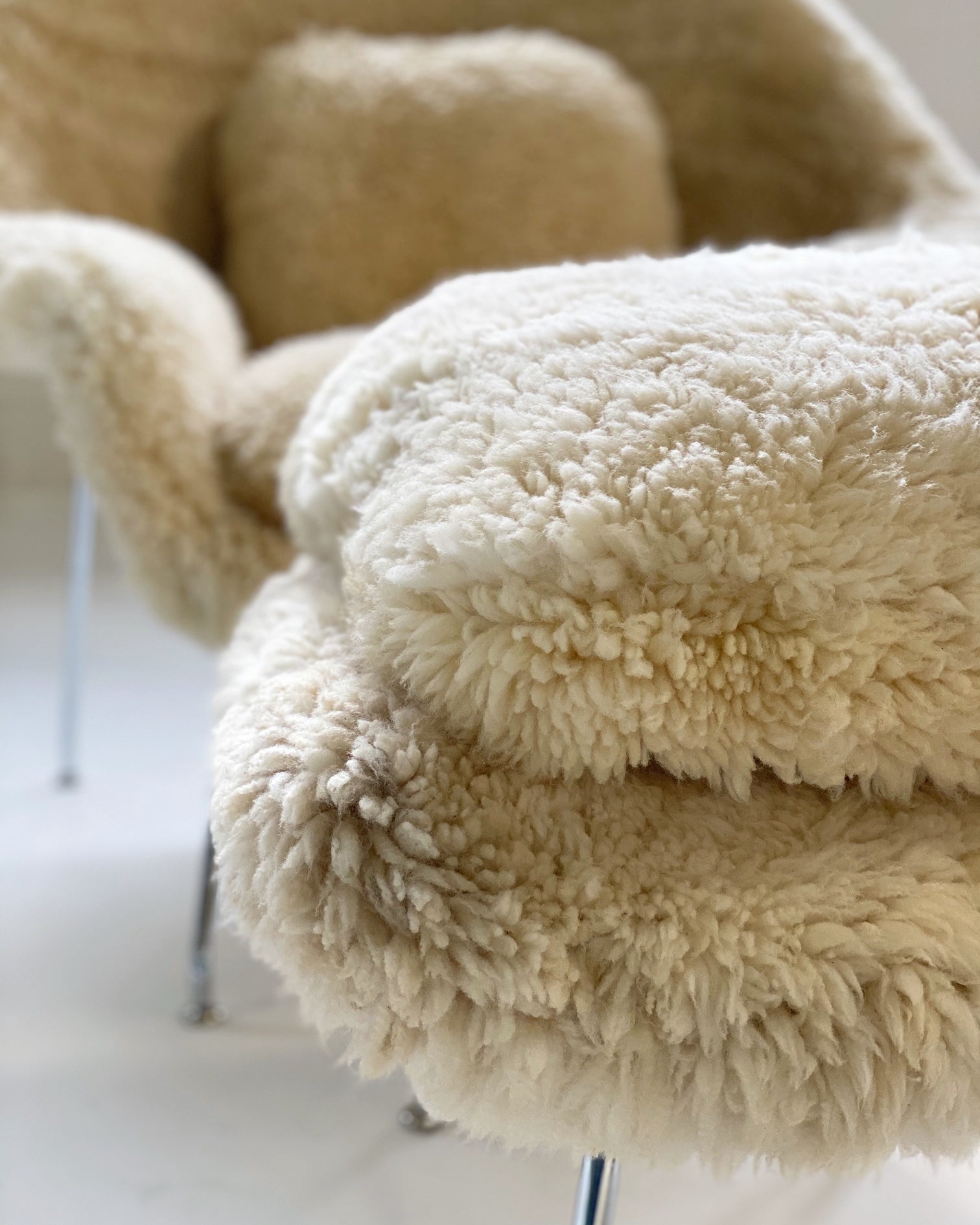 Bespoke Womb Chair and Ottoman in California Sheepskin - FORSYTH