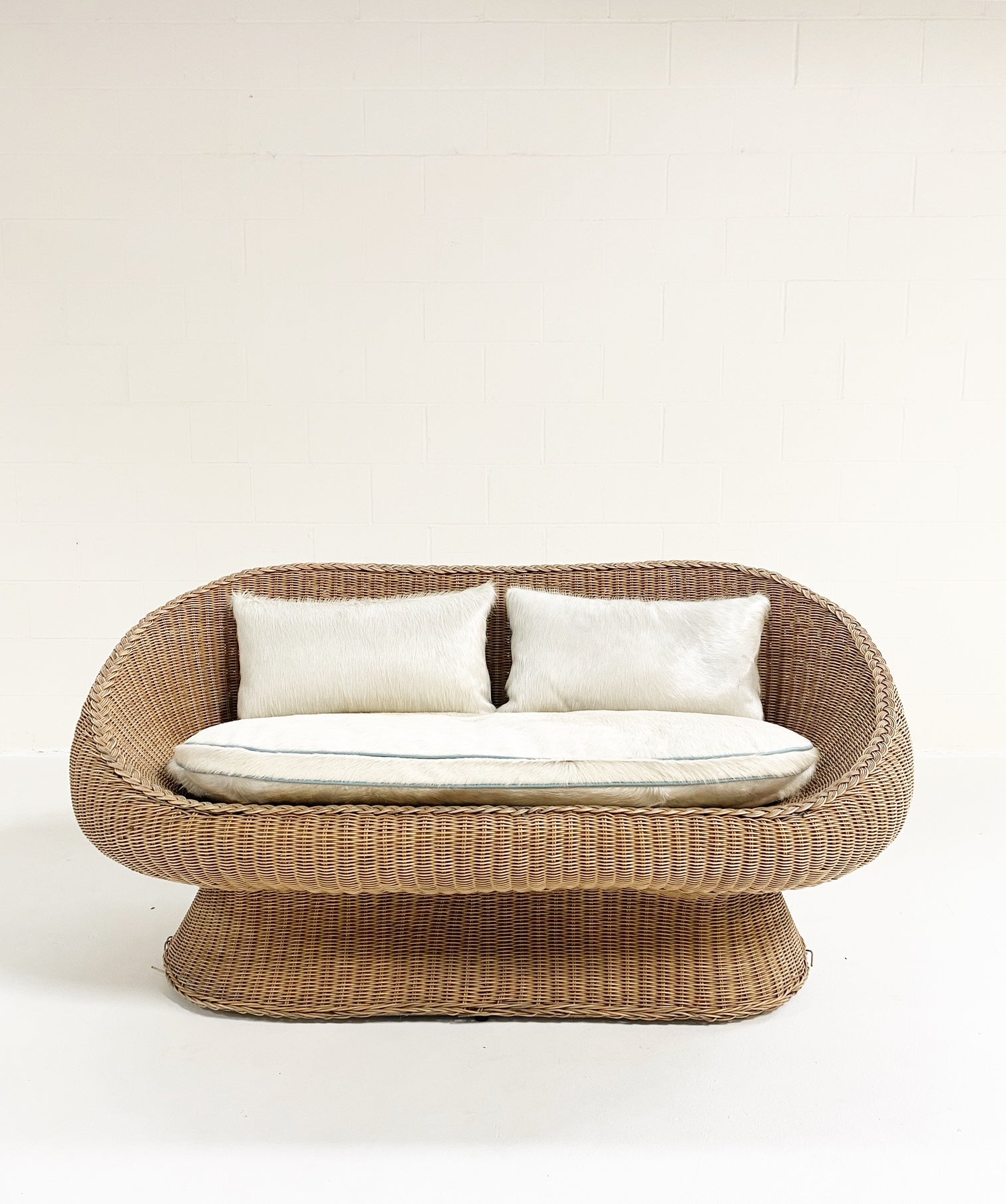 Rattan Loveseat with Custom Brazilian Cowhide and Leather Cushions