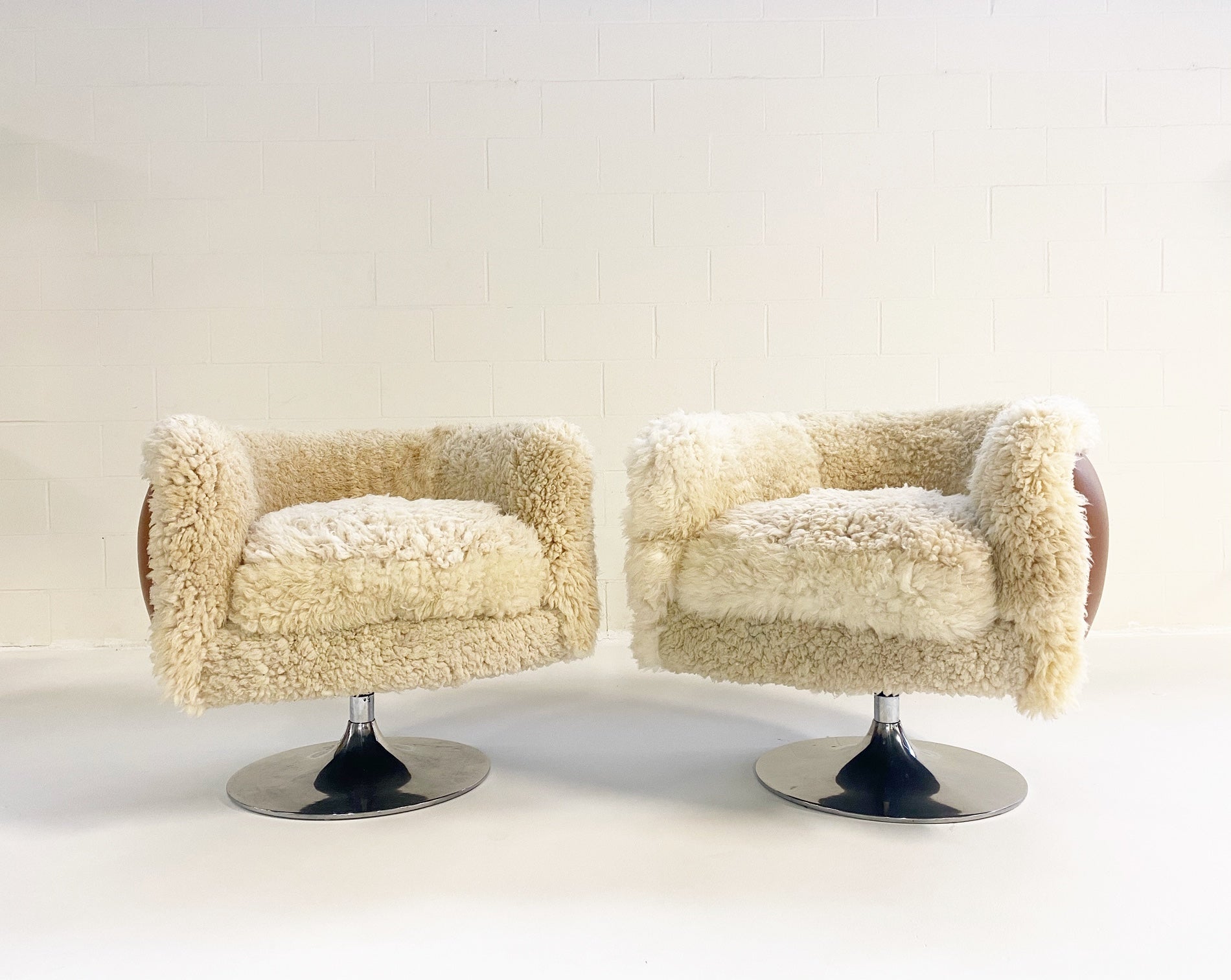 Swivel Lounge Chairs in California Sheepskin and Loro Piana Leather, pair - FORSYTH