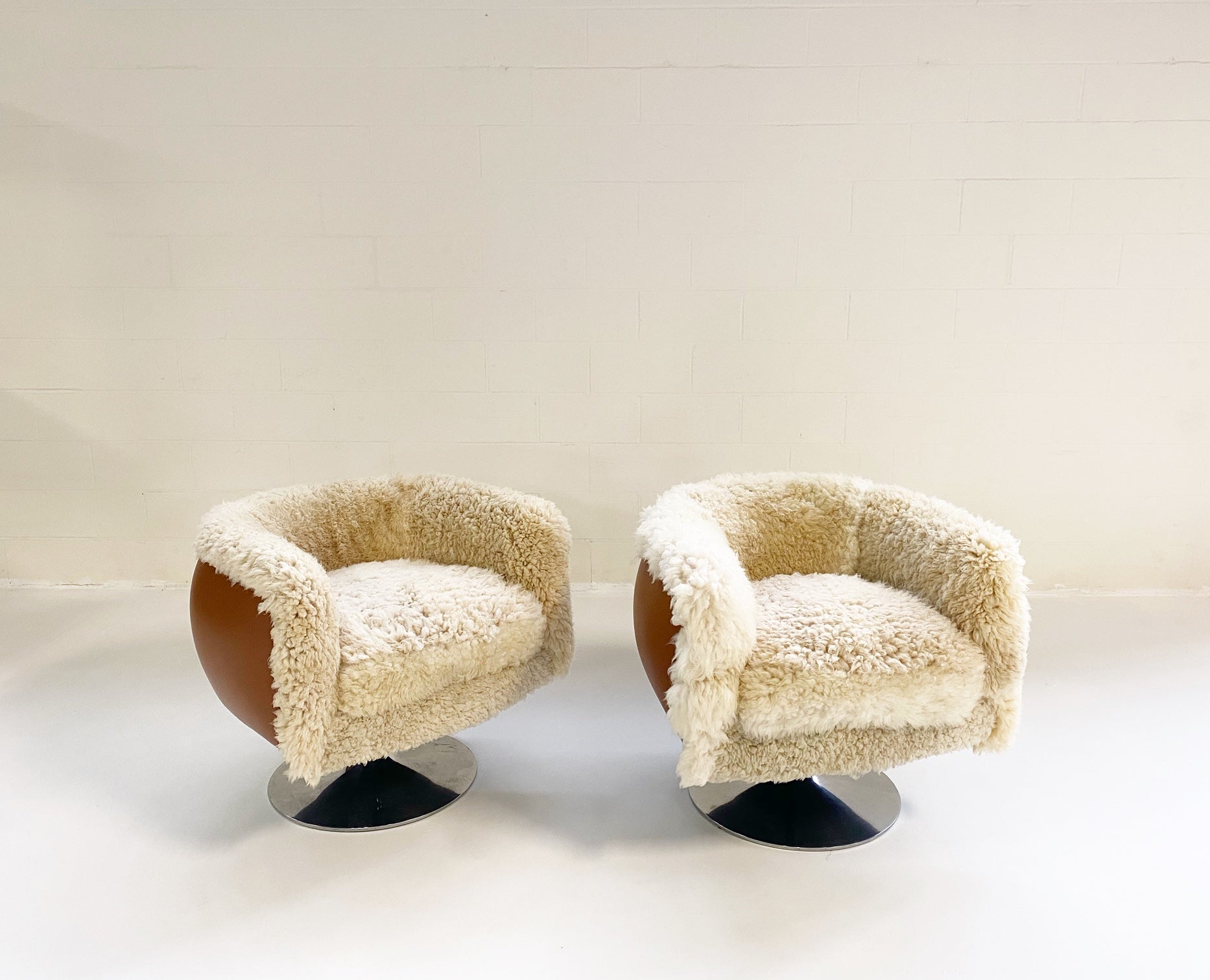 Swivel Lounge Chairs in California Sheepskin and Loro Piana Leather, pair - FORSYTH