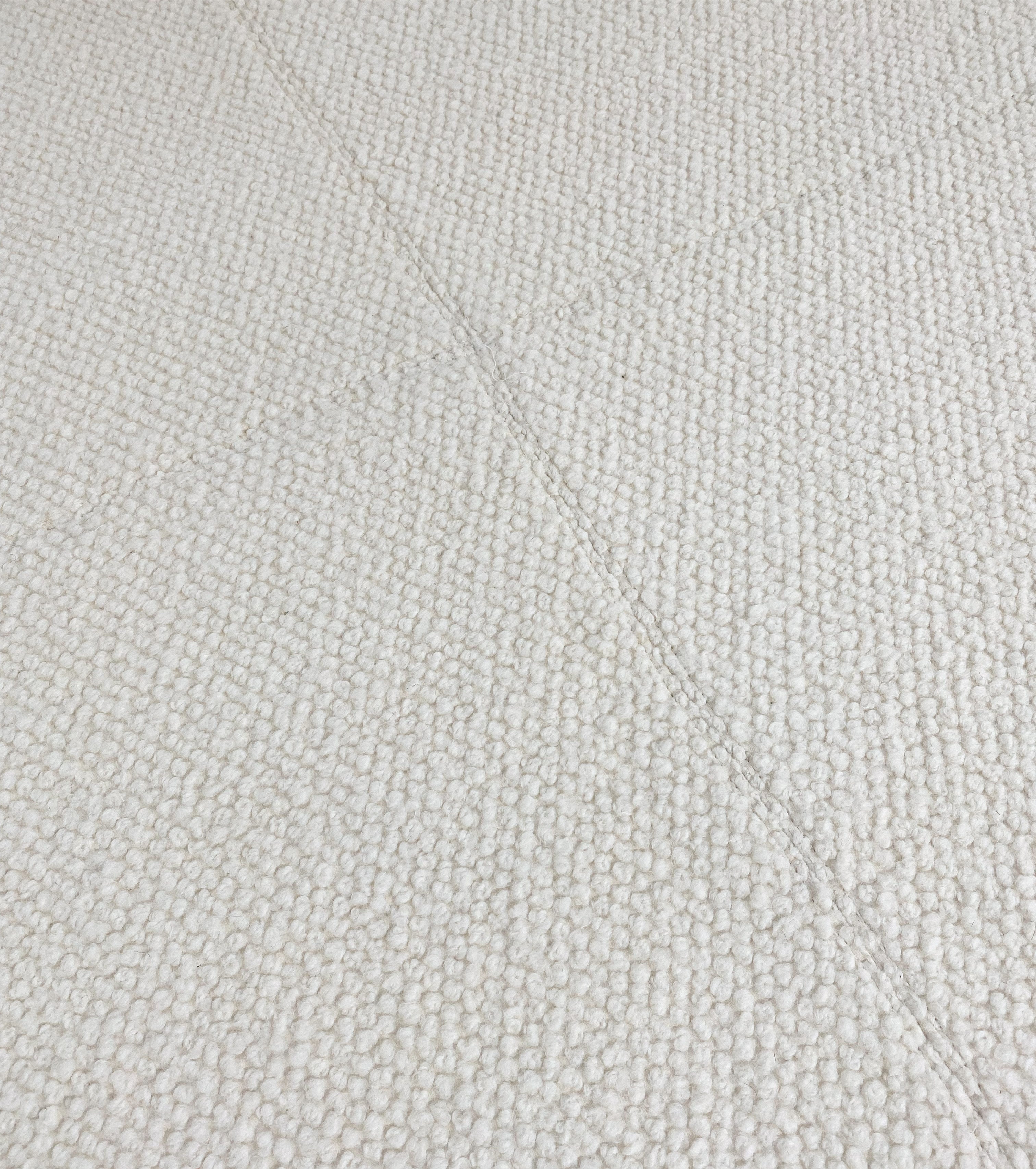 The Forsyth Ottoman in Dedar Boucle, 54 x 54 in