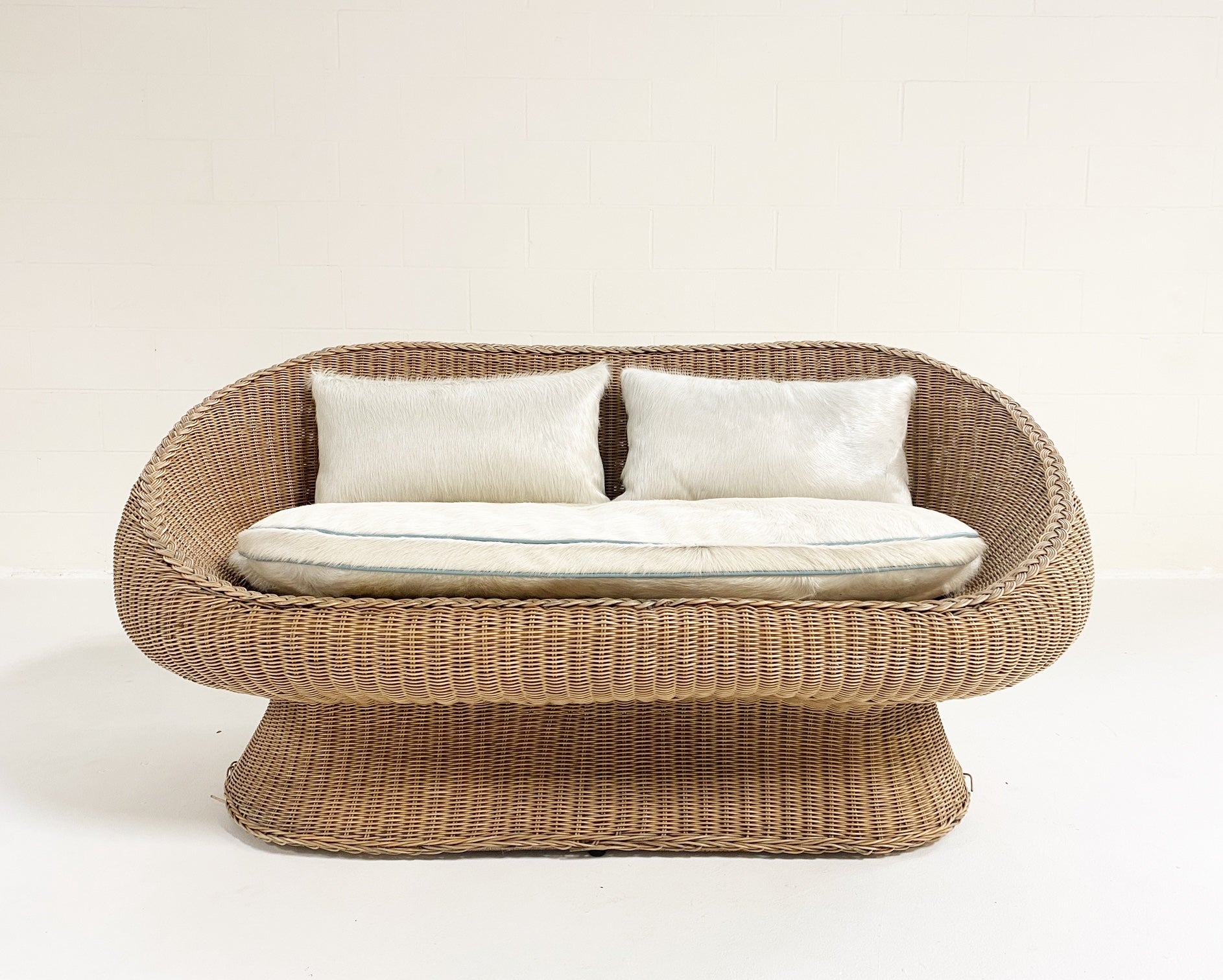 Rattan Loveseat with Custom Brazilian Cowhide and Leather Cushions