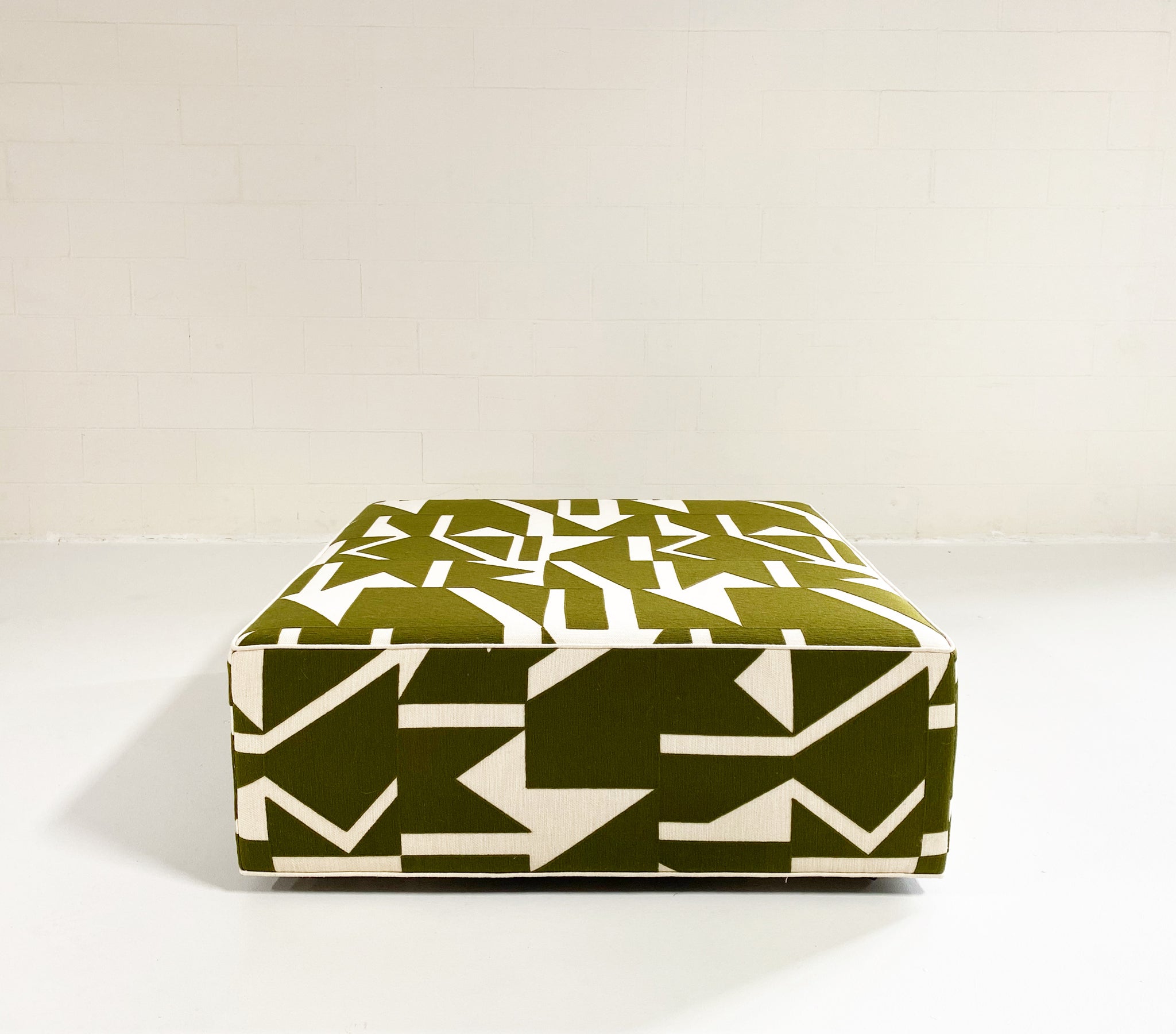 The Forsyth Ottoman in Pierre Frey Wokabi Fabric