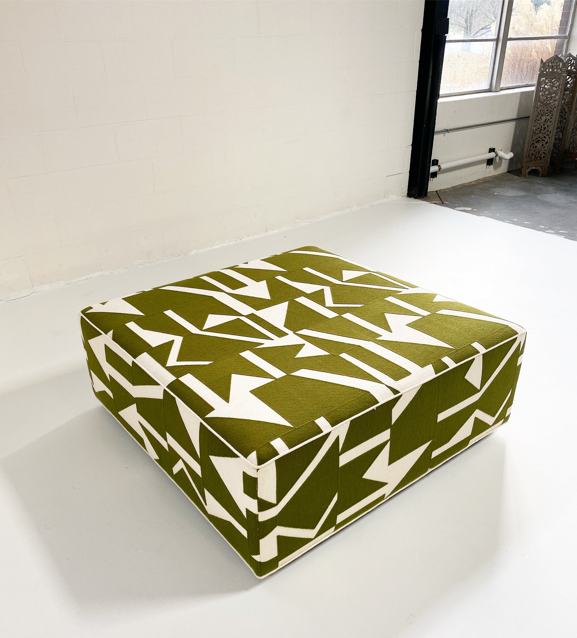 The Forsyth Ottoman in Pierre Frey Wokabi Fabric