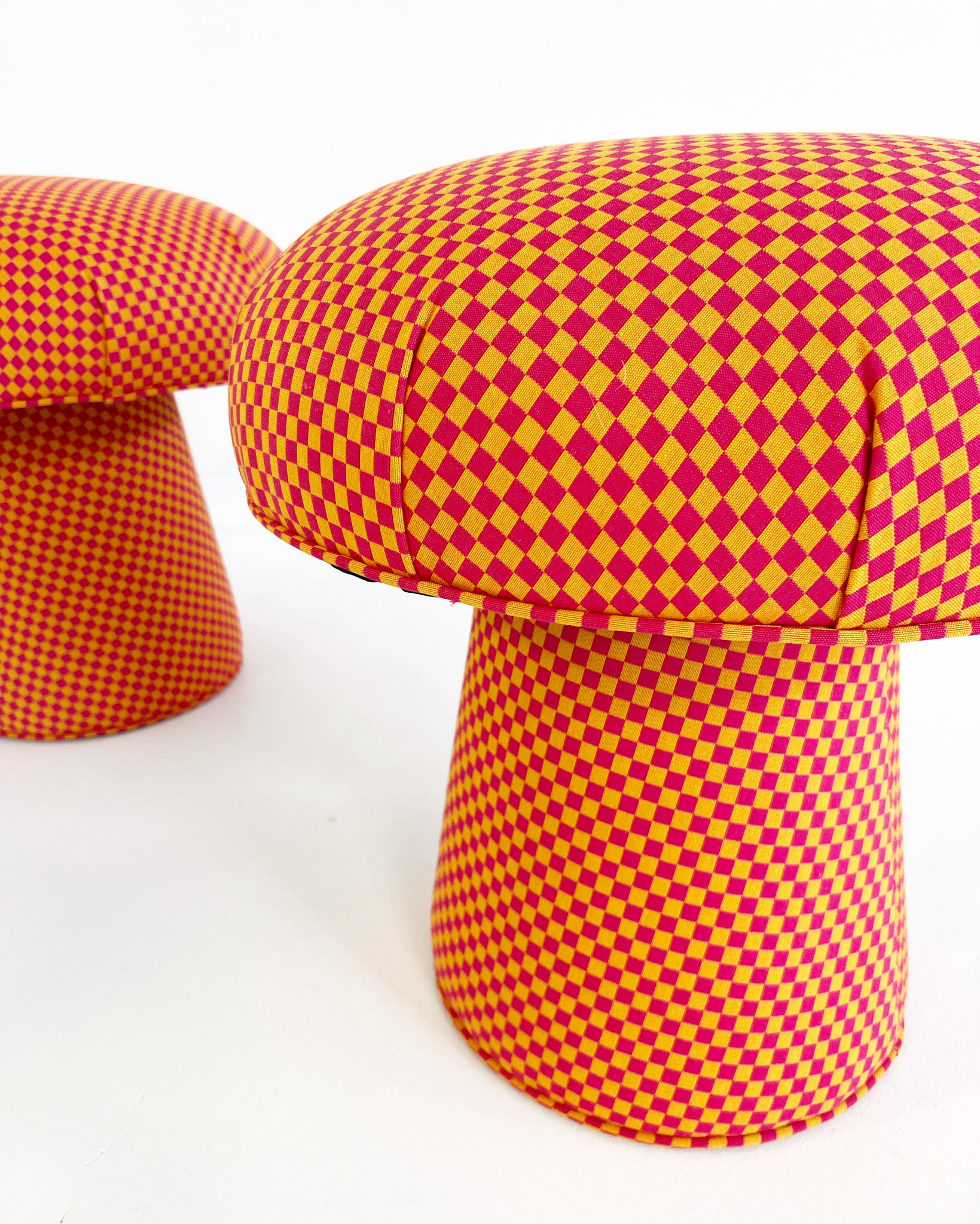 The Forsyth Mushroom Pouf in Maharam Checker by Alexander Girard