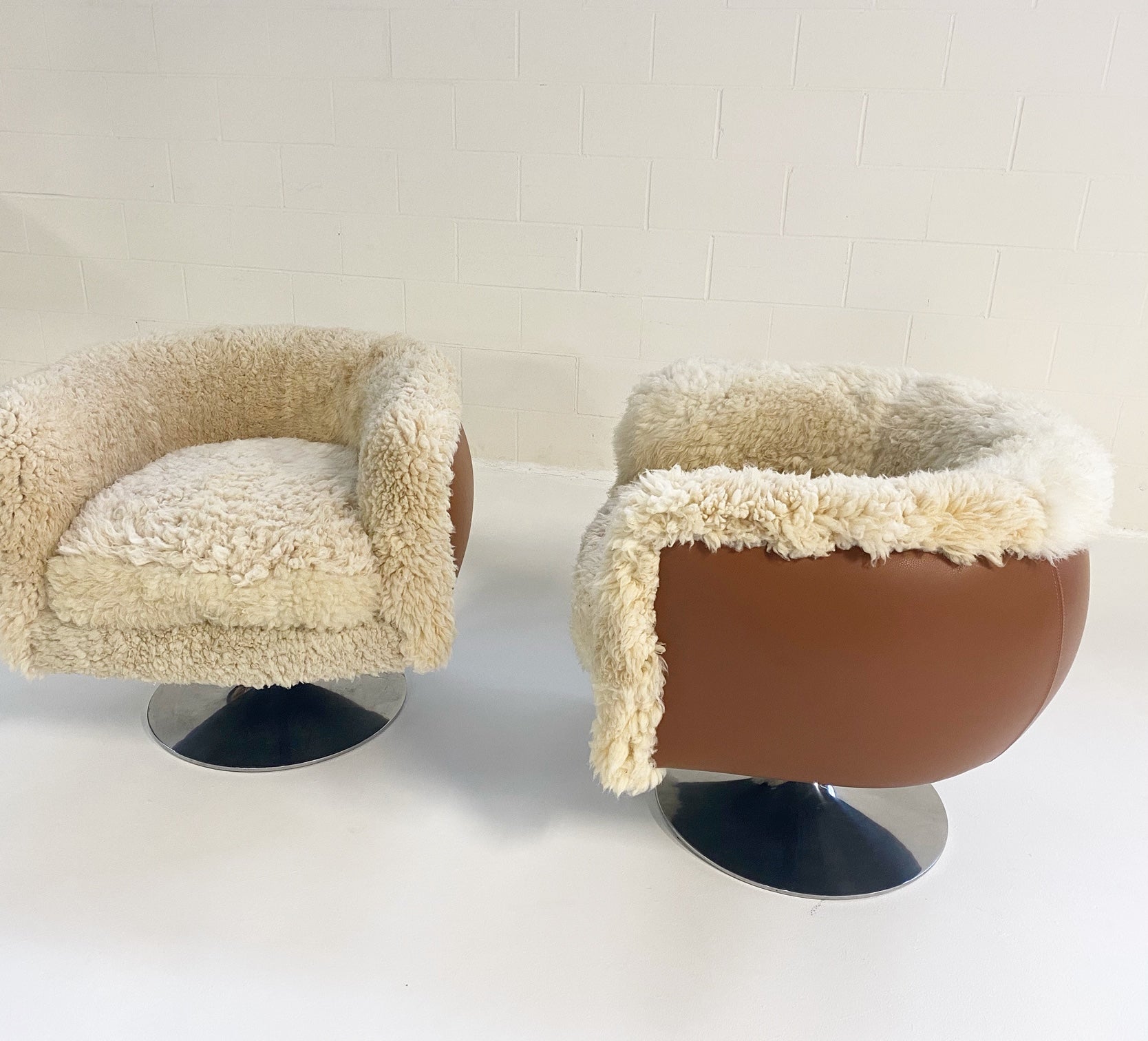 Swivel Lounge Chairs in California Sheepskin and Loro Piana Leather, pair - FORSYTH