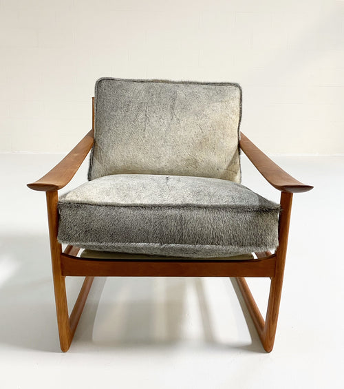 FD-130 Teak Lounge Chair and Ottoman in Brazilian Cowhide