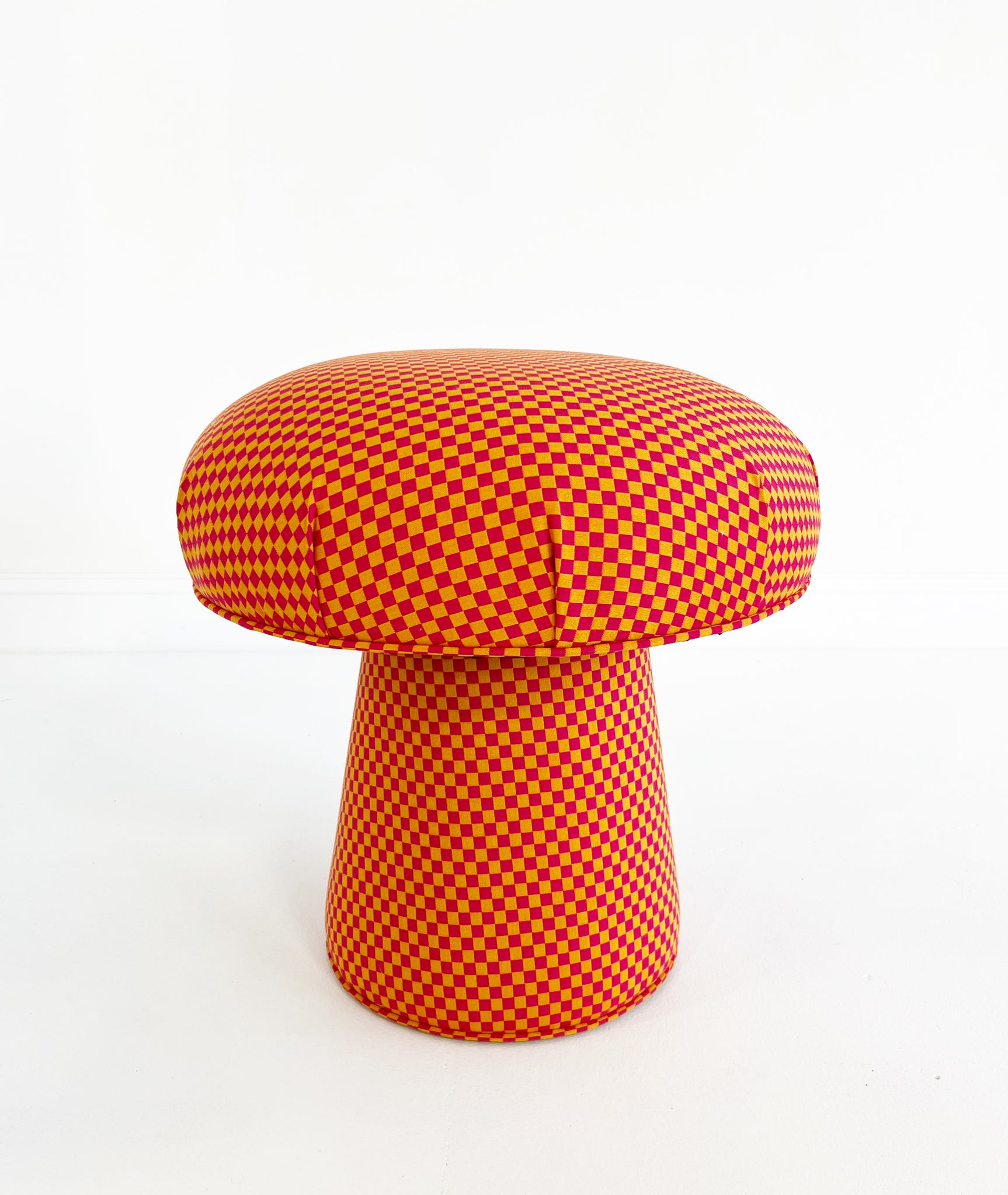 The Forsyth Mushroom Pouf in Maharam Checker by Alexander Girard