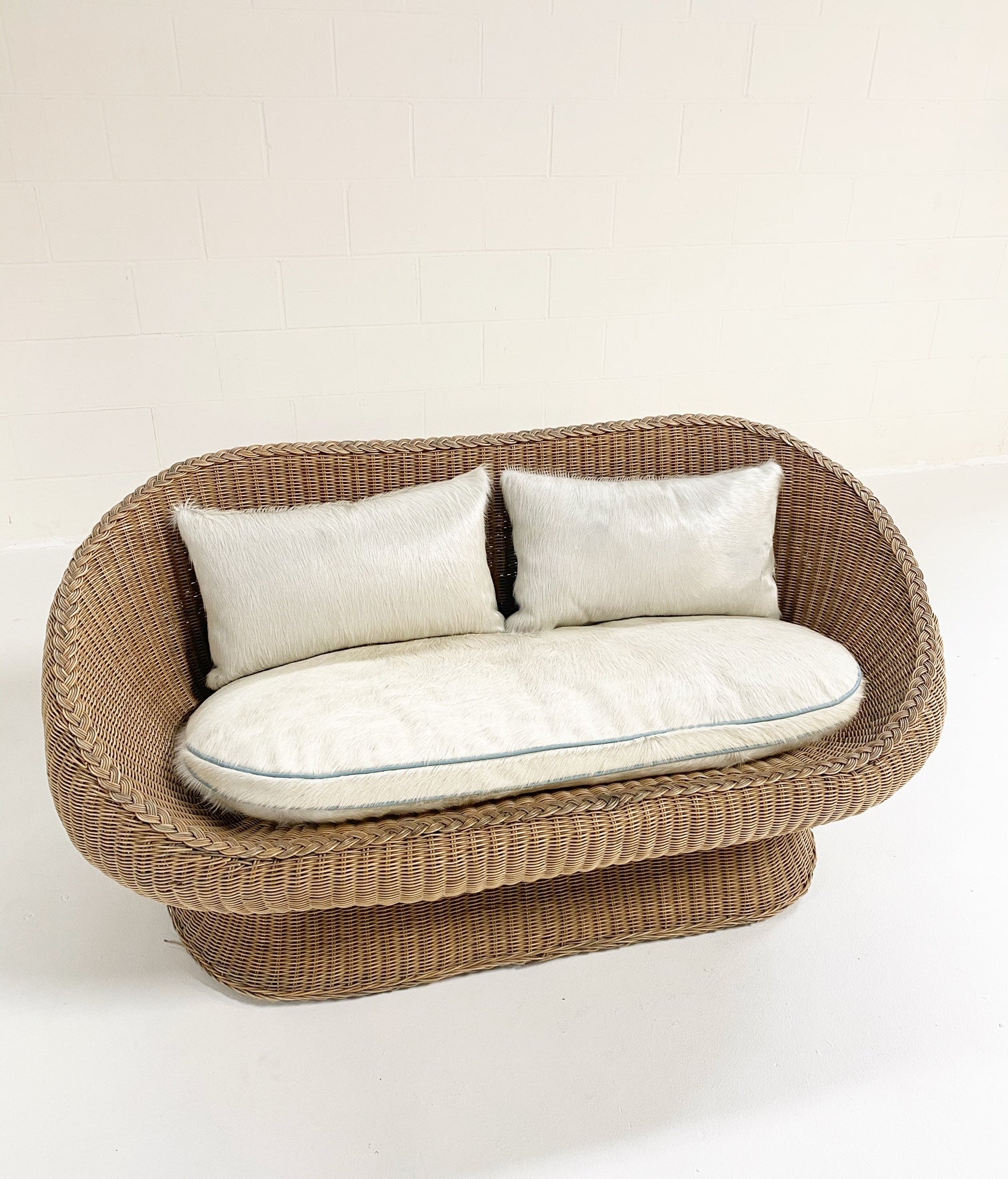 Rattan Loveseat with Custom Brazilian Cowhide and Leather Cushions