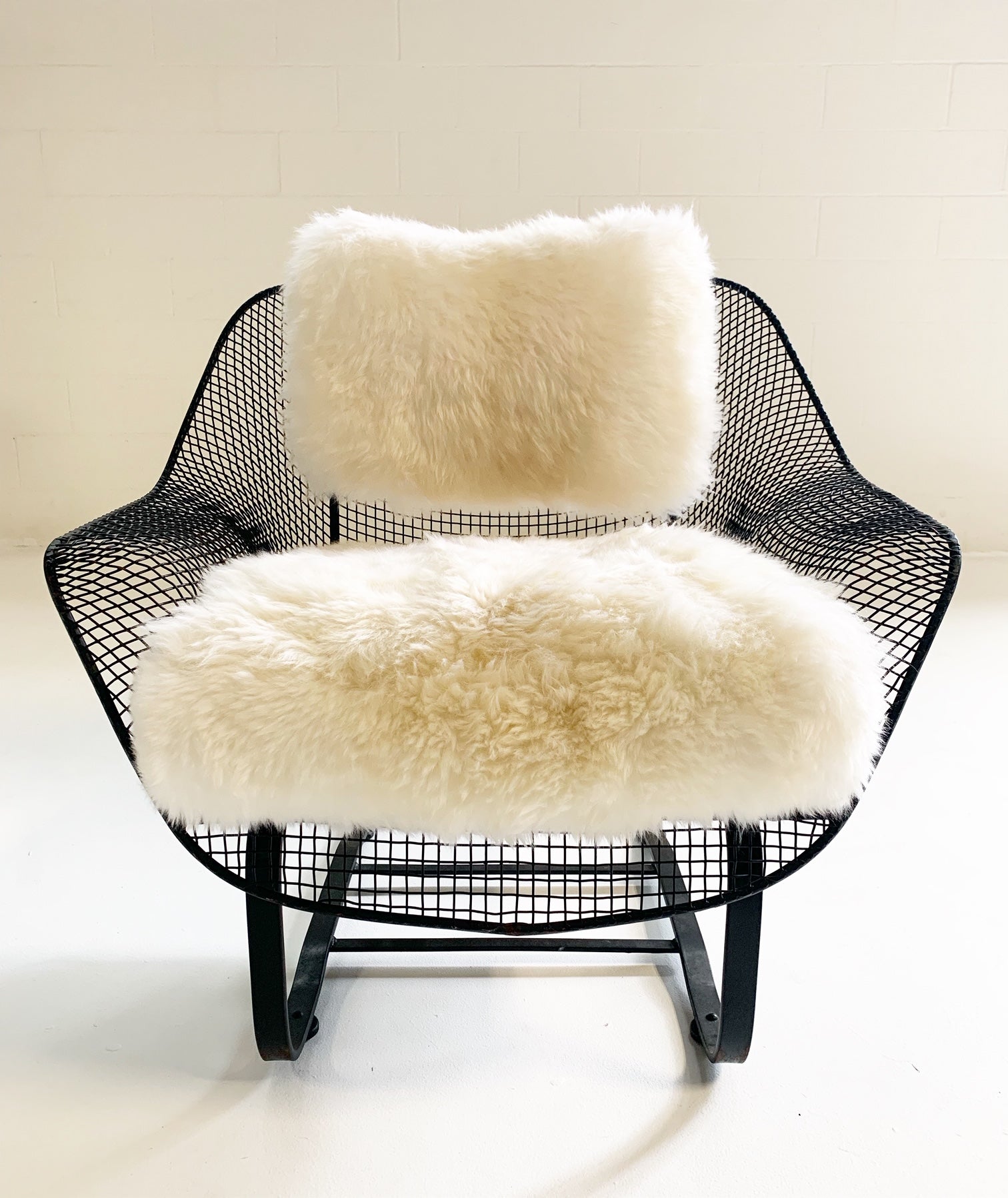 Sculptura Lounge Chairs and Ottoman with Sheepskin Cushions - FORSYTH