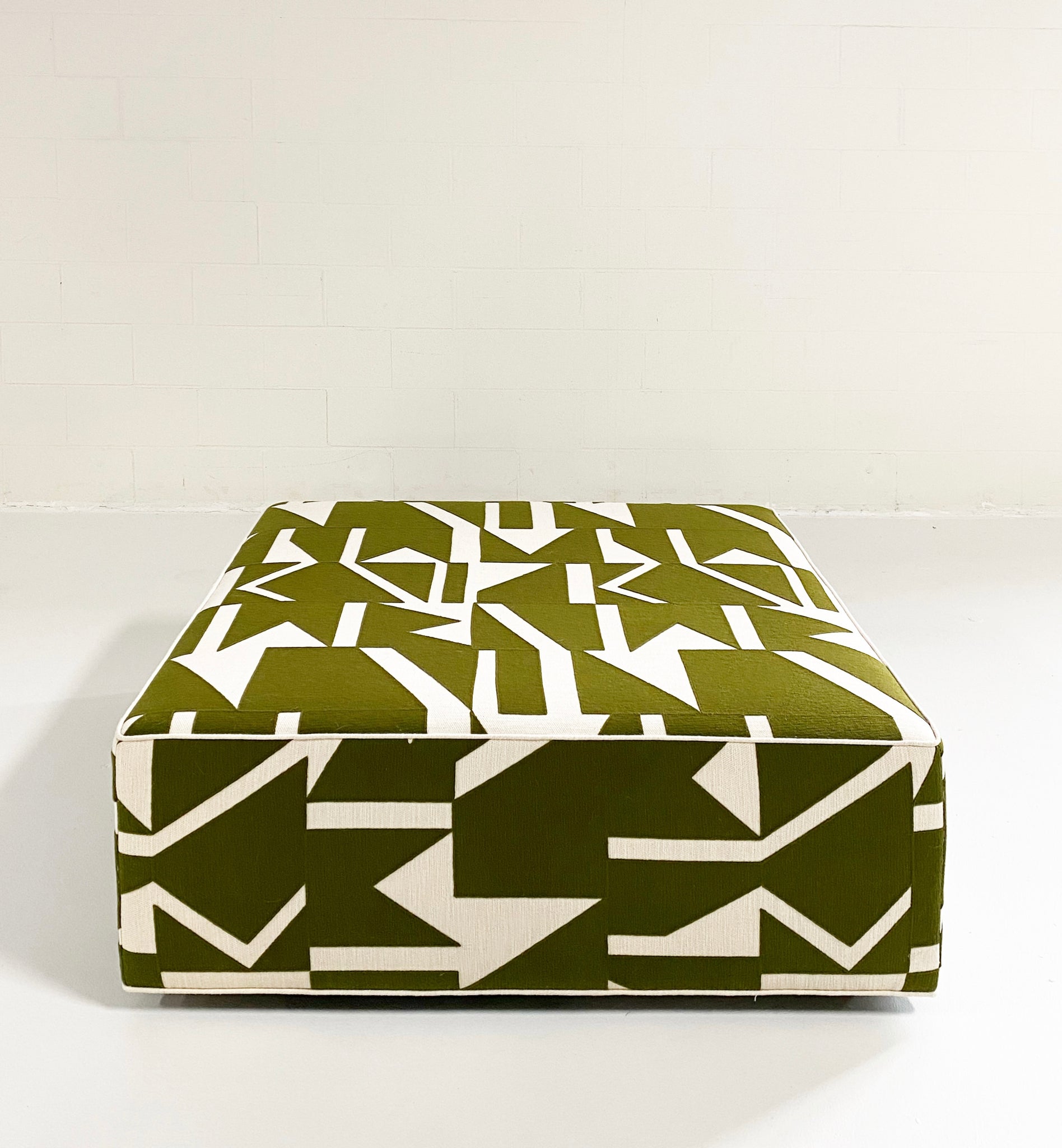 The Forsyth Ottoman in Pierre Frey Wokabi Fabric