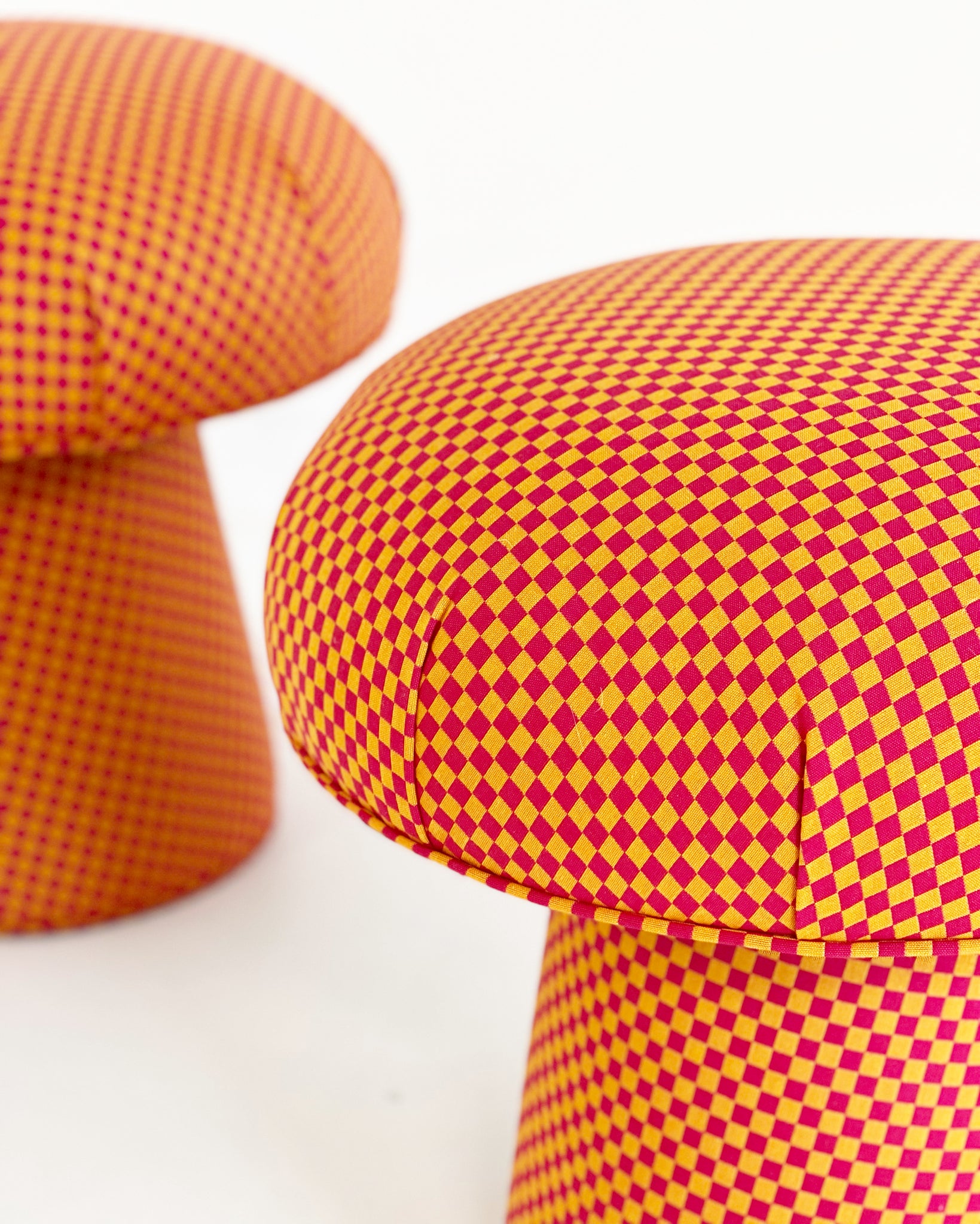 The Forsyth Mushroom Pouf in Maharam Checker by Alexander Girard