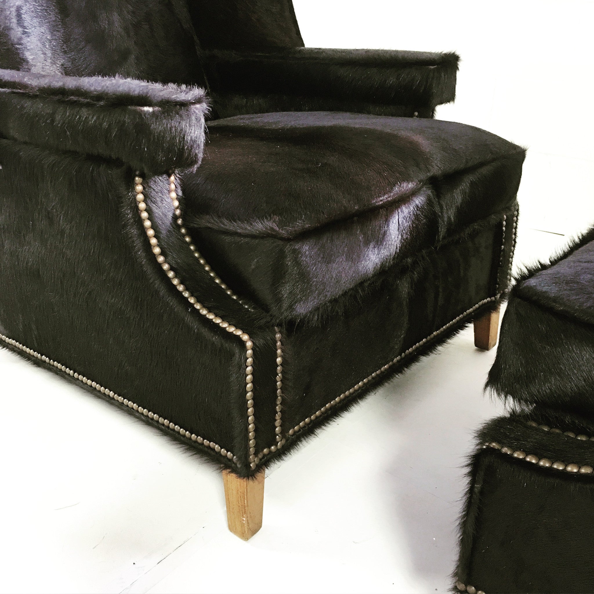Wingbacks with Ottoman in Brazilian Cowhide, pair - FORSYTH