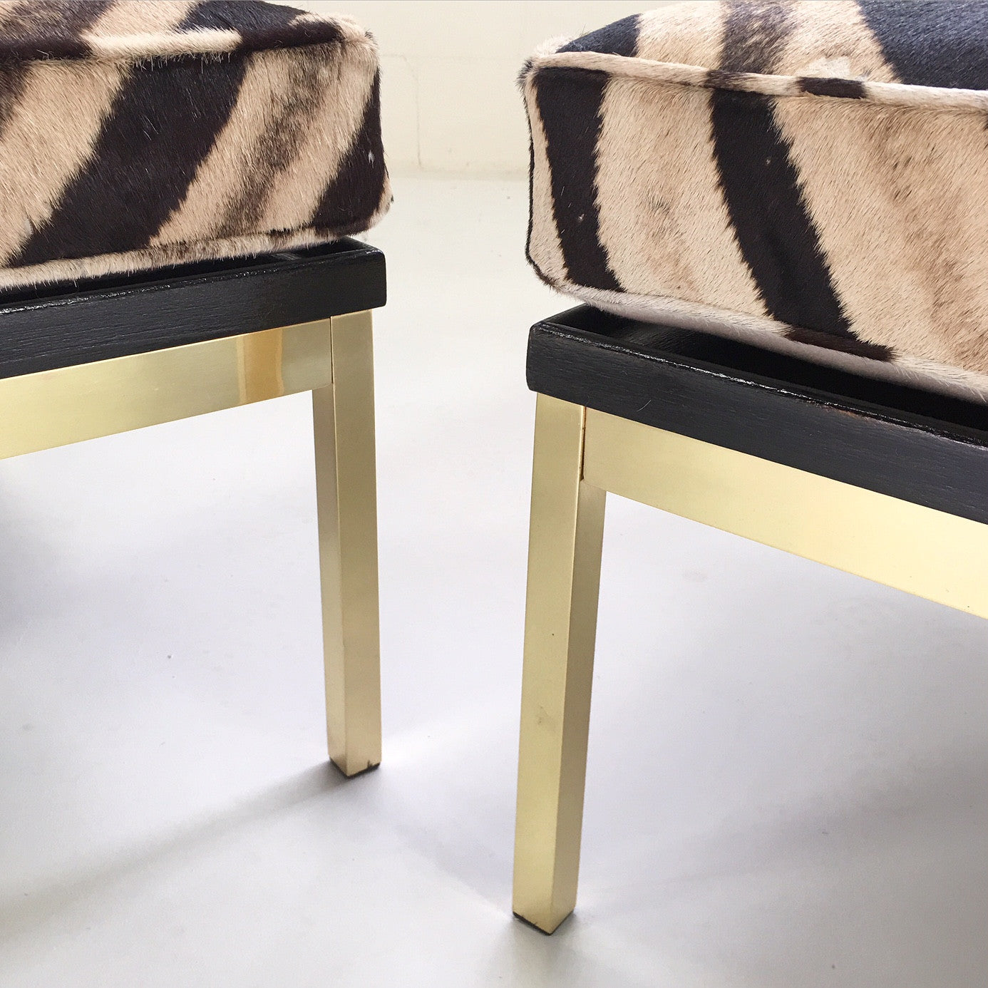 Knoll Style Zebra Hide and Brass Ottomans, pair - FORSYTH