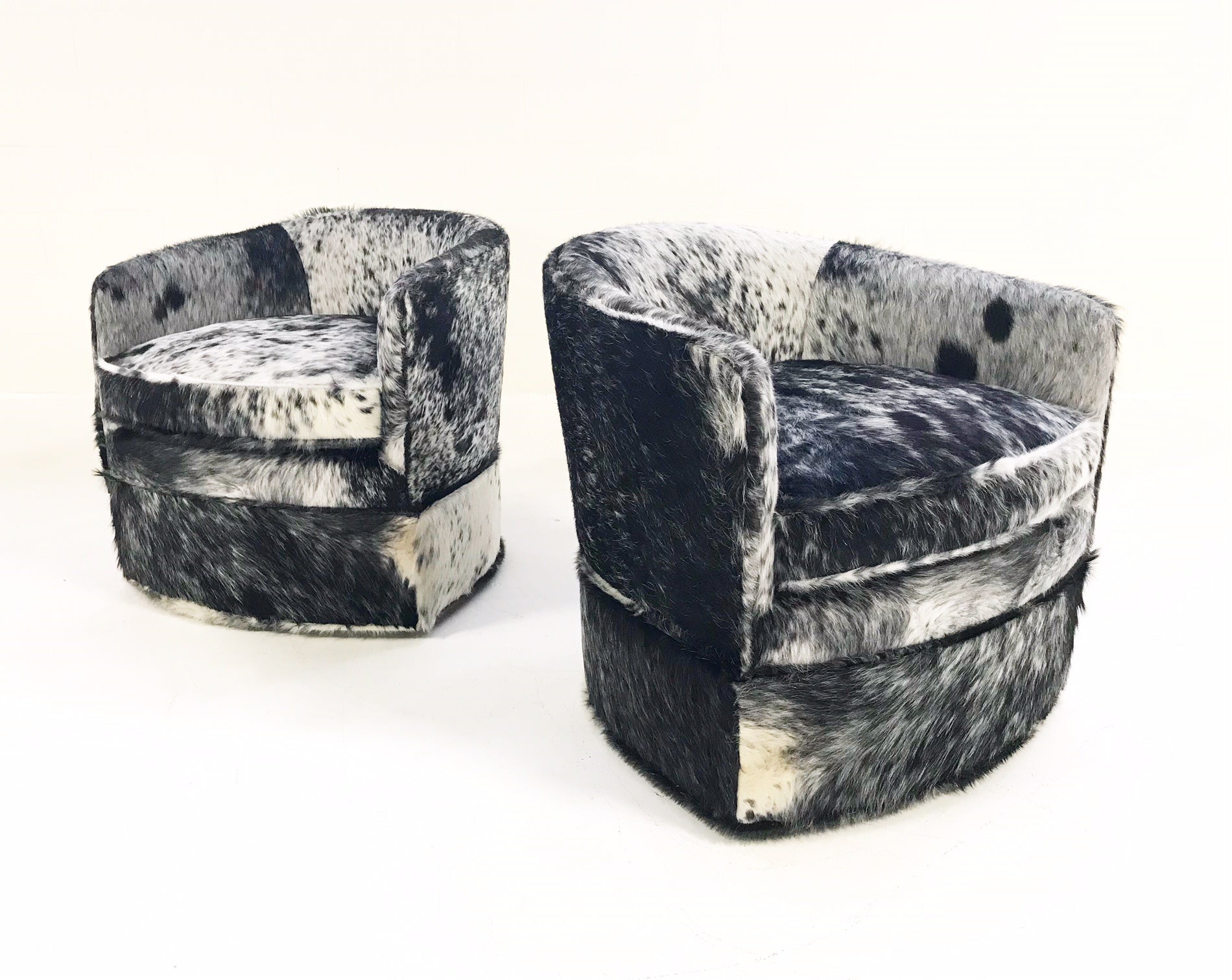 Wheeled Slipper Chairs in Brazilian Cowhide, pair - FORSYTH