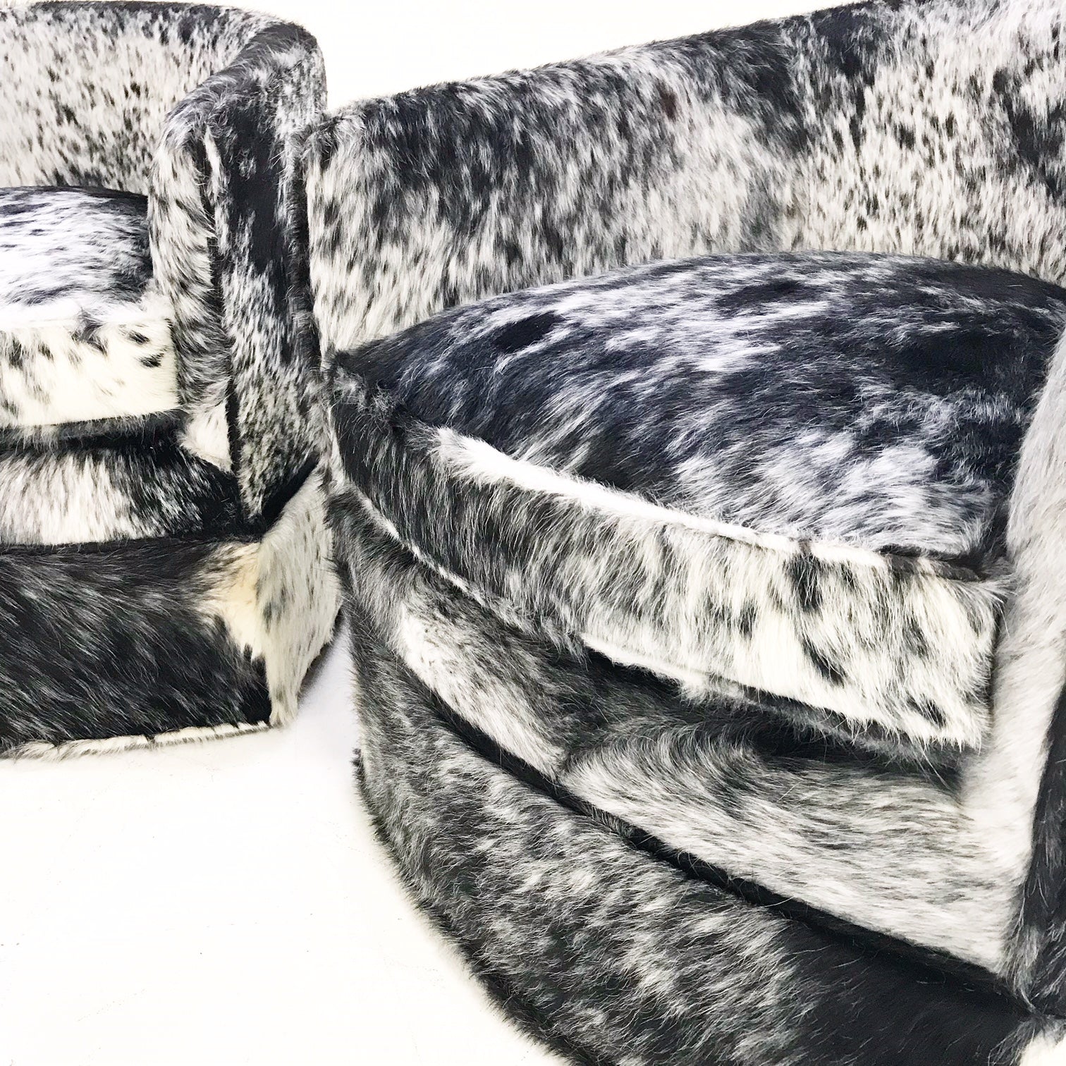 Wheeled Slipper Chairs in Brazilian Cowhide, pair - FORSYTH