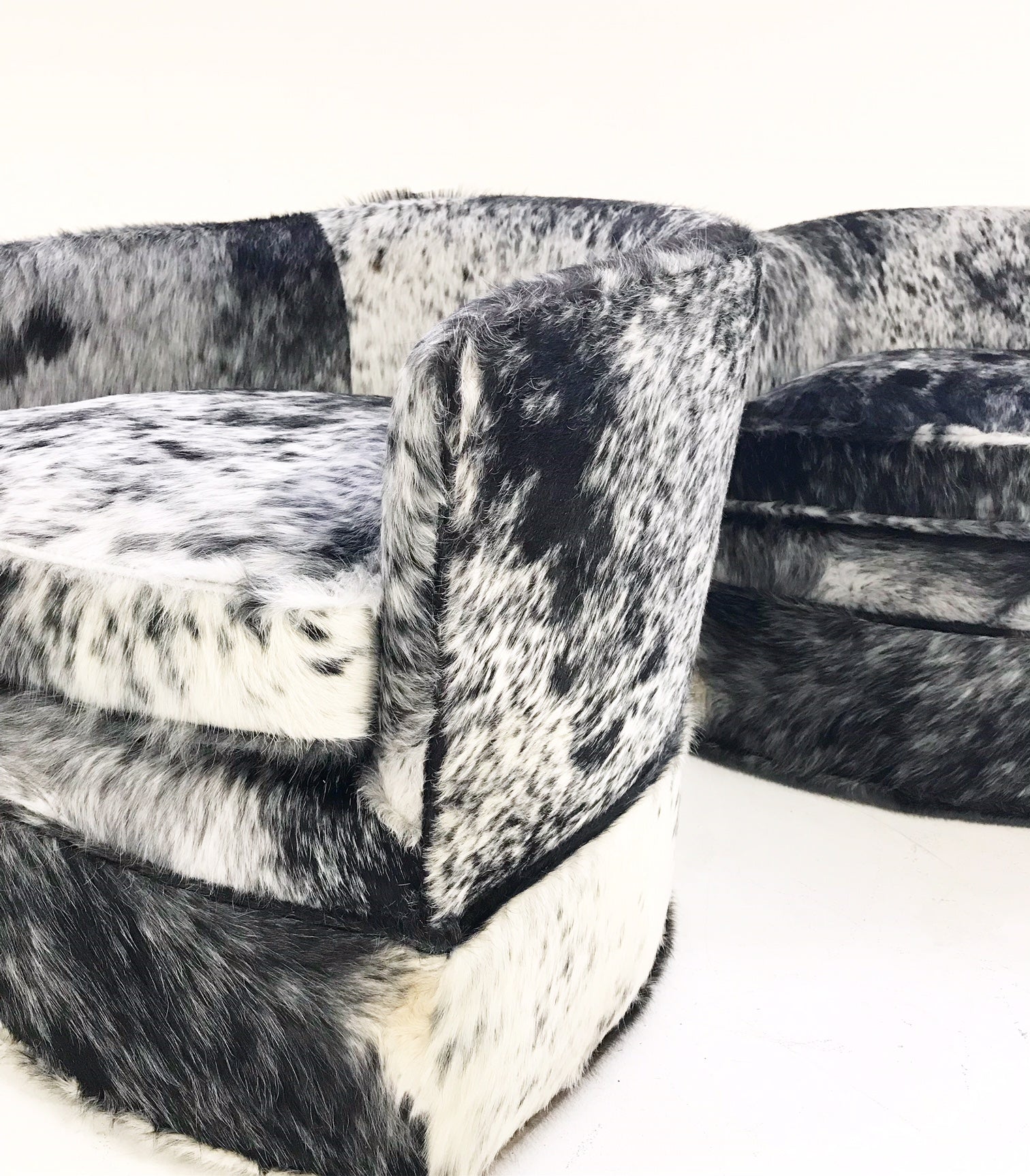 Wheeled Slipper Chairs in Brazilian Cowhide, pair - FORSYTH