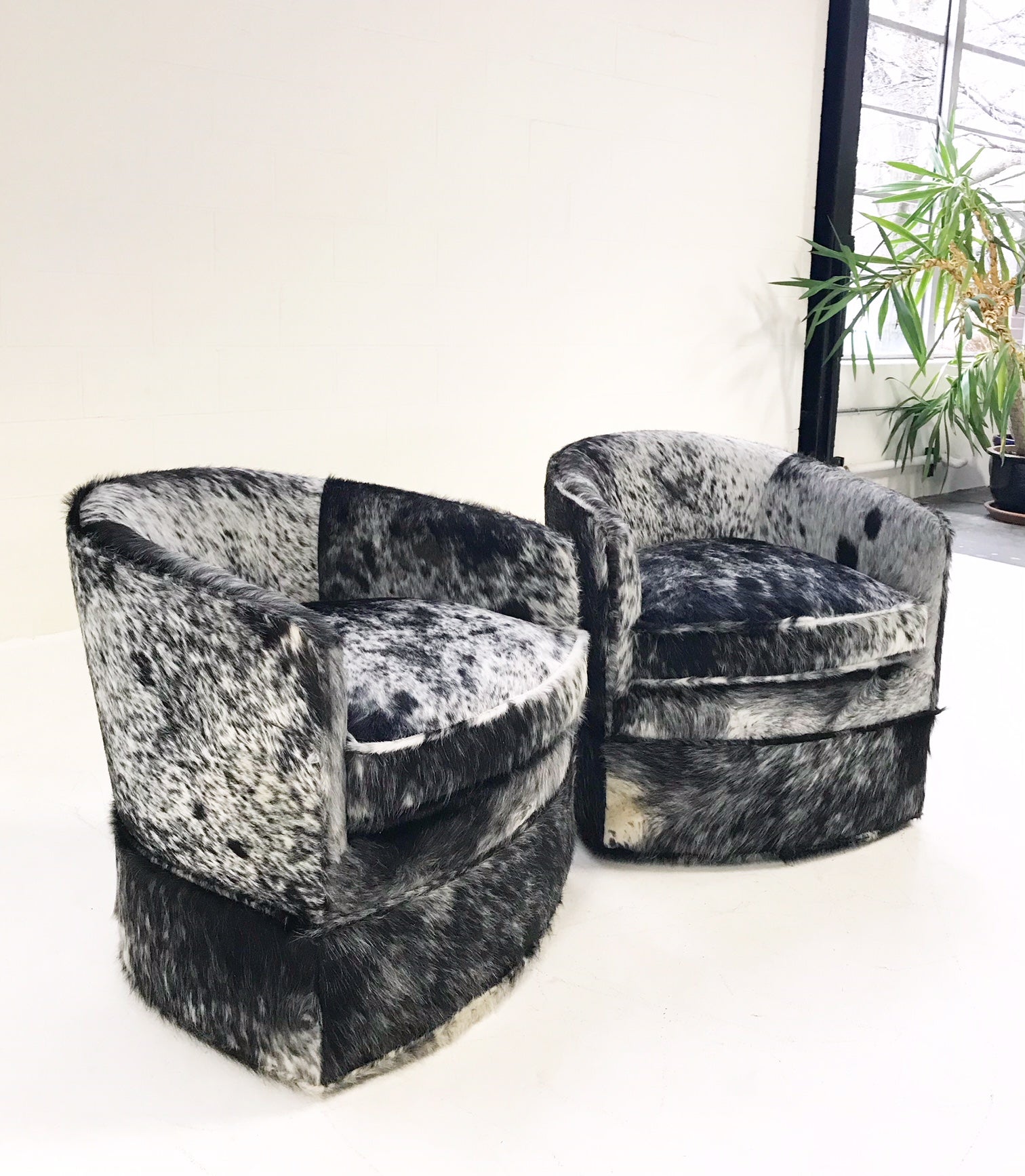 Wheeled Slipper Chairs in Brazilian Cowhide, pair - FORSYTH