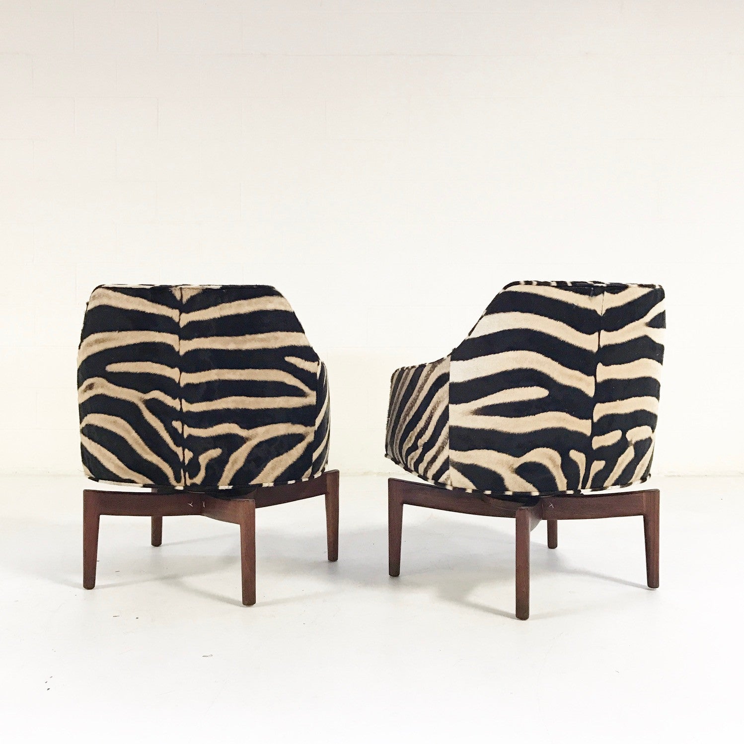 Walnut Swivel Chairs in Zebra Hide, pair - FORSYTH