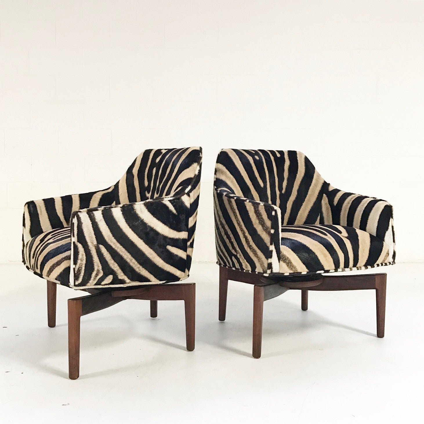 Walnut Swivel Chairs in Zebra Hide, pair - FORSYTH