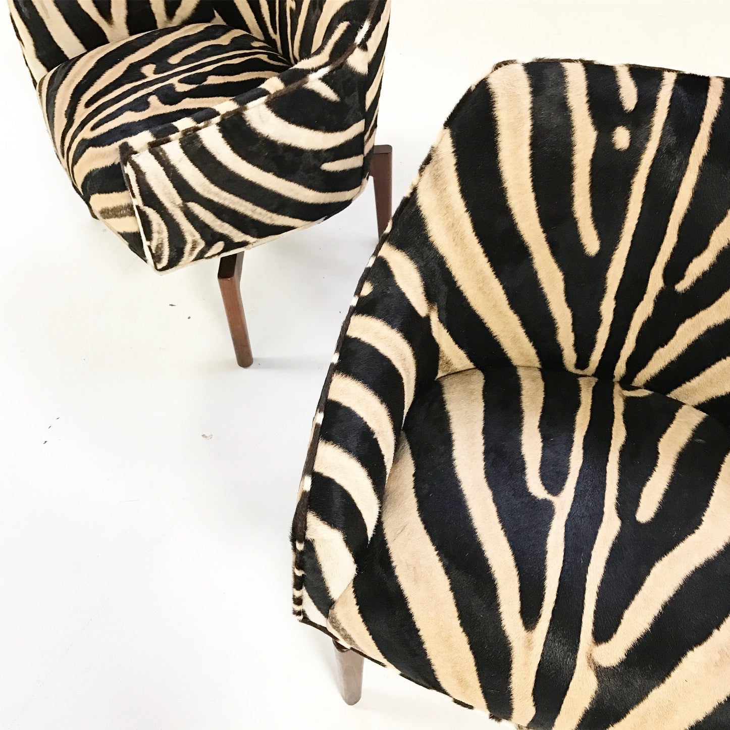 Walnut Swivel Chairs in Zebra Hide, pair - FORSYTH