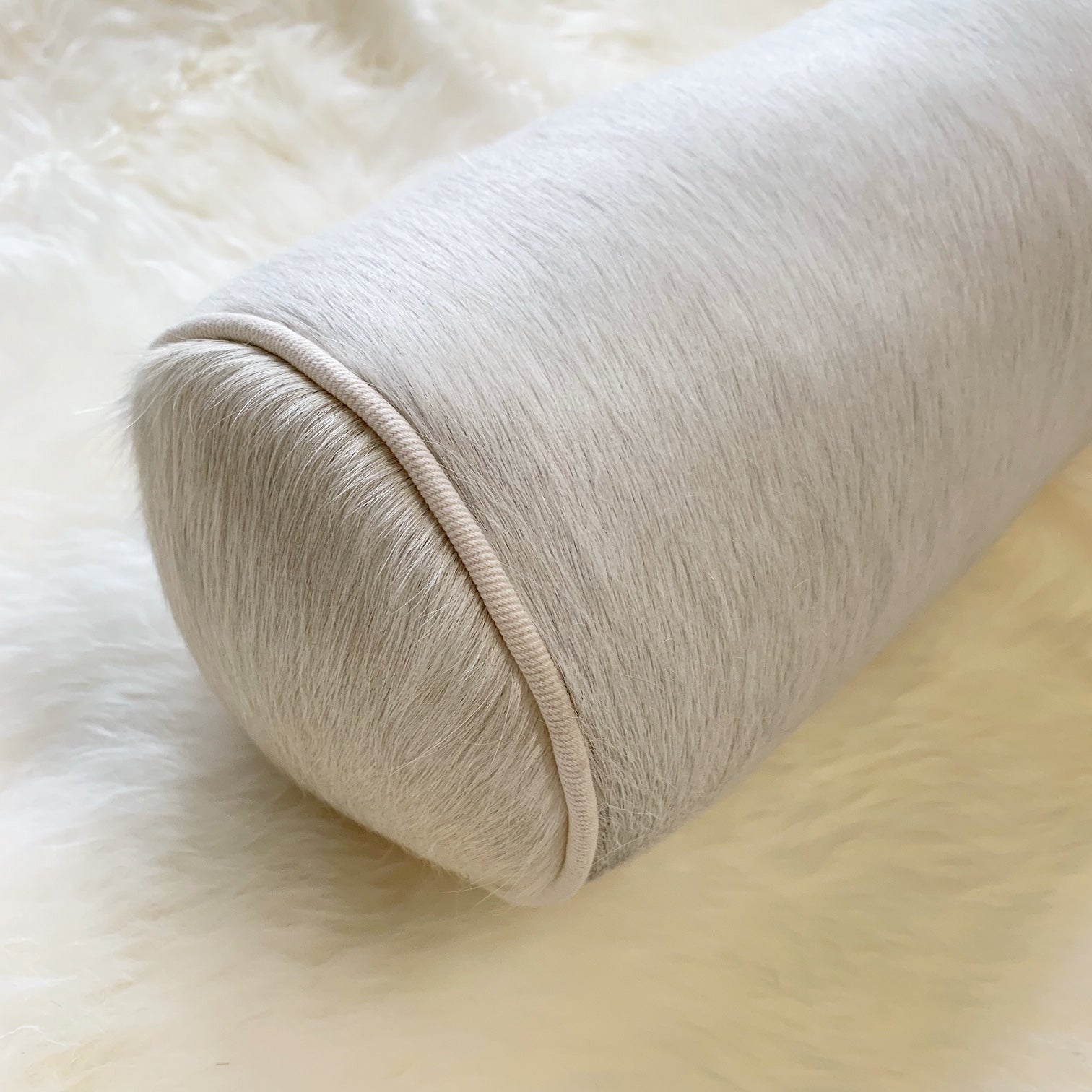 Ivory Cowhide Bolster Pillow, 20" - FORSYTH