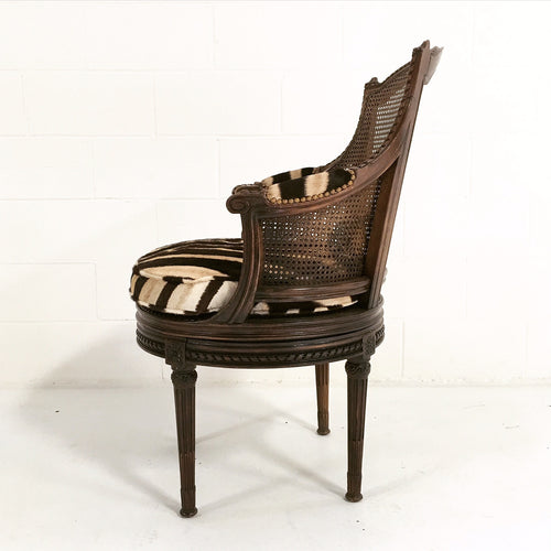 Antique Bergere Swivel Chair in Zebra Hide - FORSYTH