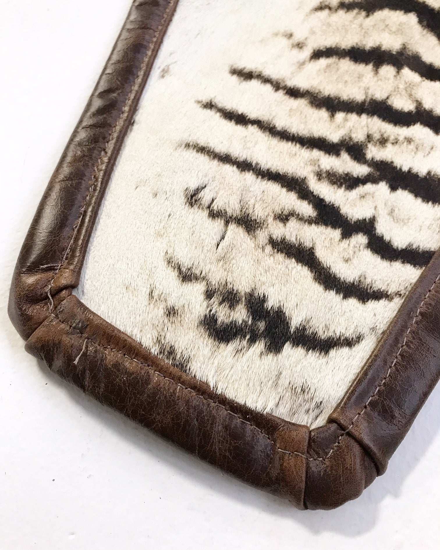 Zebra Hide Rug, Trimmed in Leather - FORSYTH