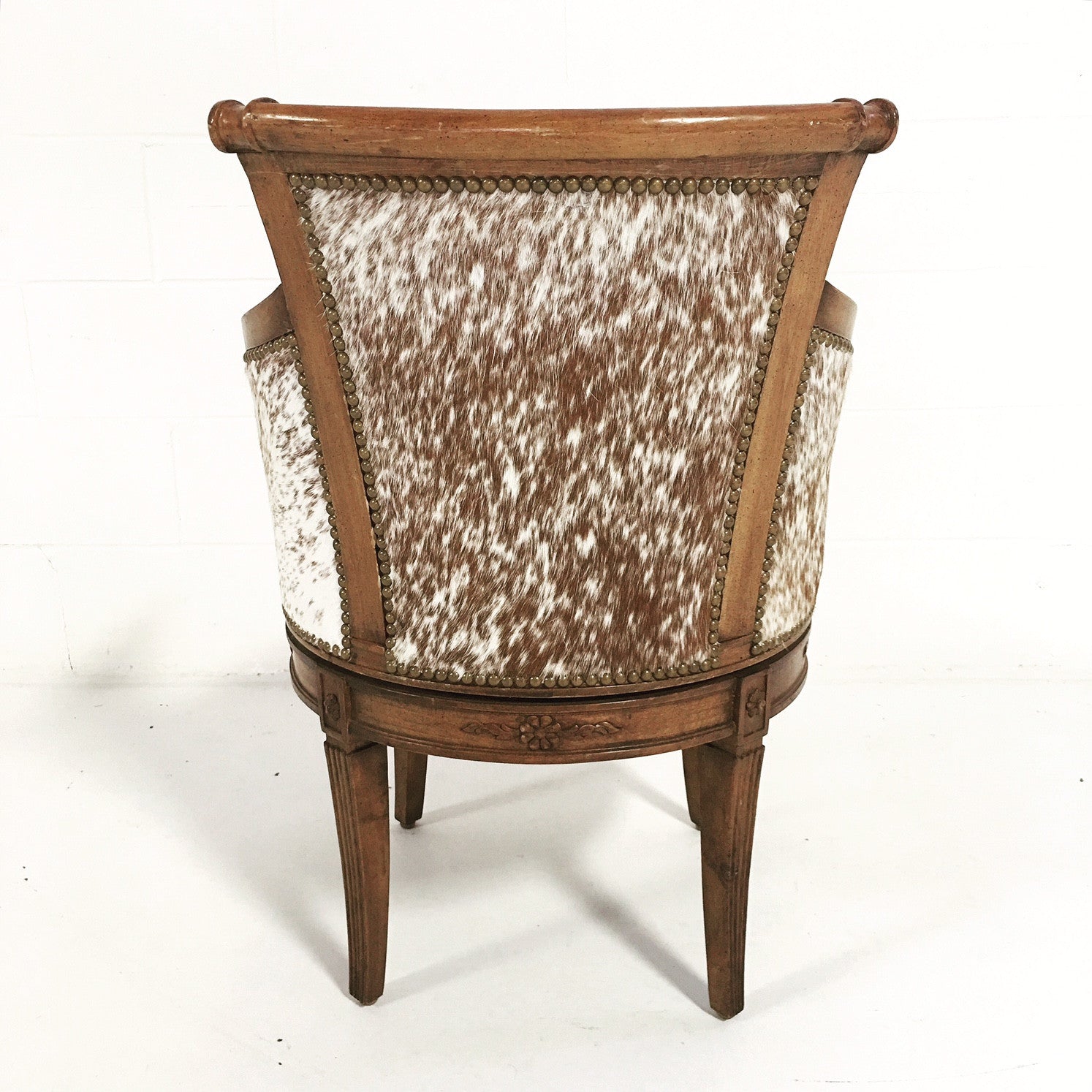 Vintage Swivel Chair in Brazilian Cowhide - FORSYTH