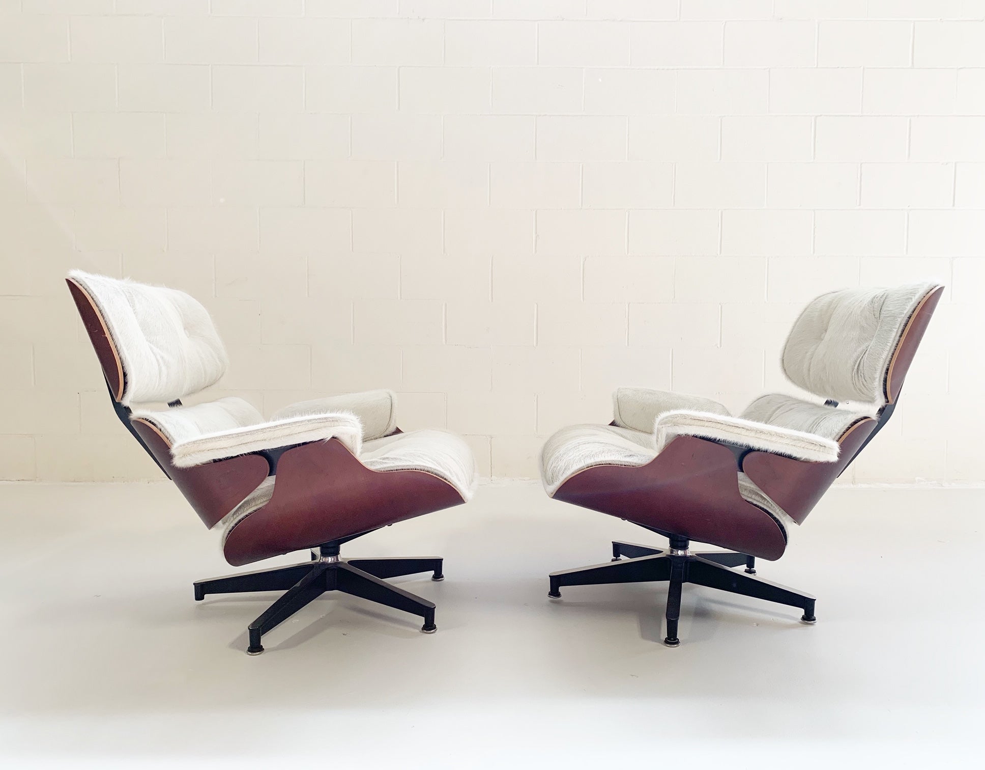 670 Lounge Chairs and 671 Ottomans in Brazilian Cowhide - FORSYTH
