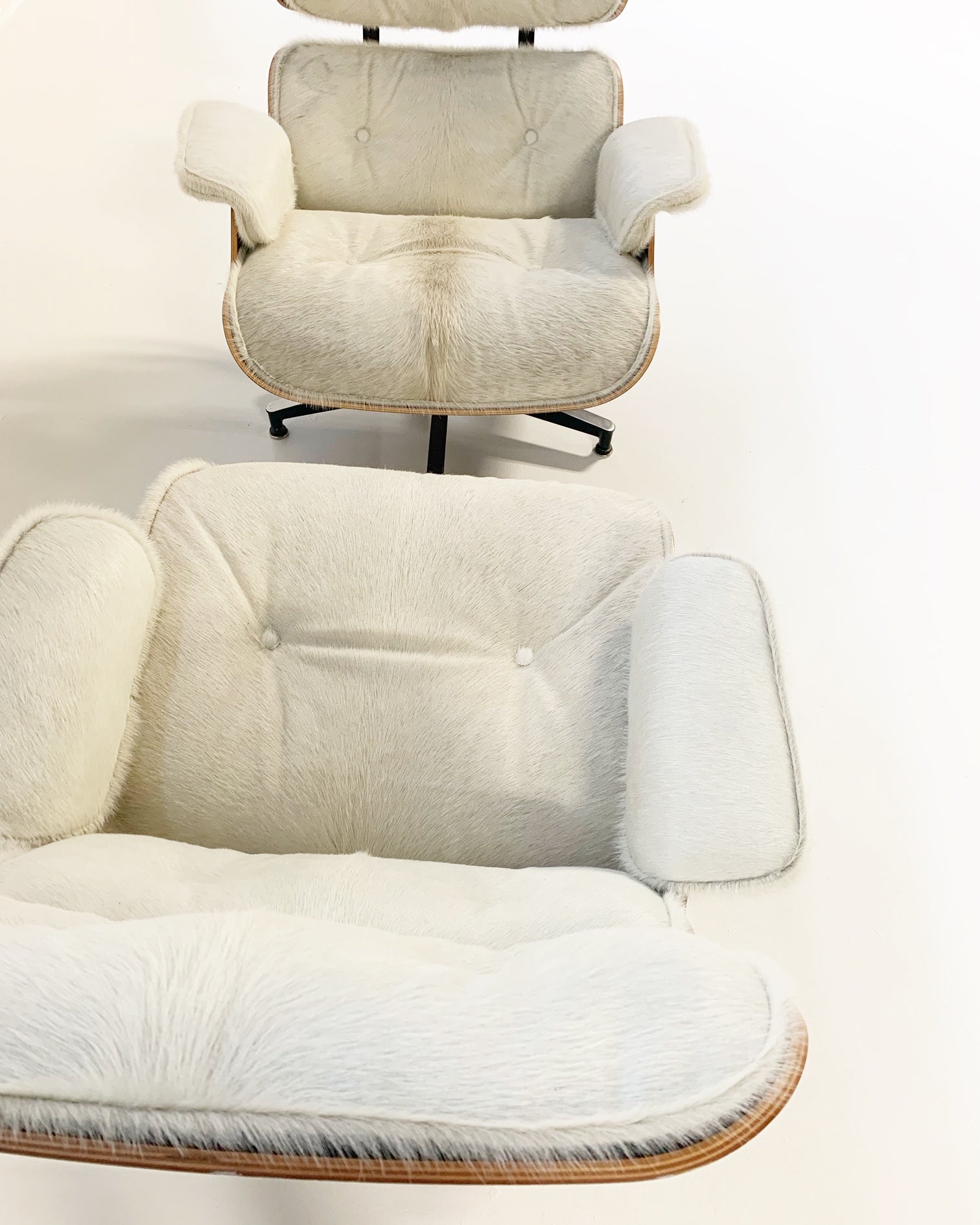 670 Lounge Chairs and 671 Ottomans in Brazilian Cowhide - FORSYTH
