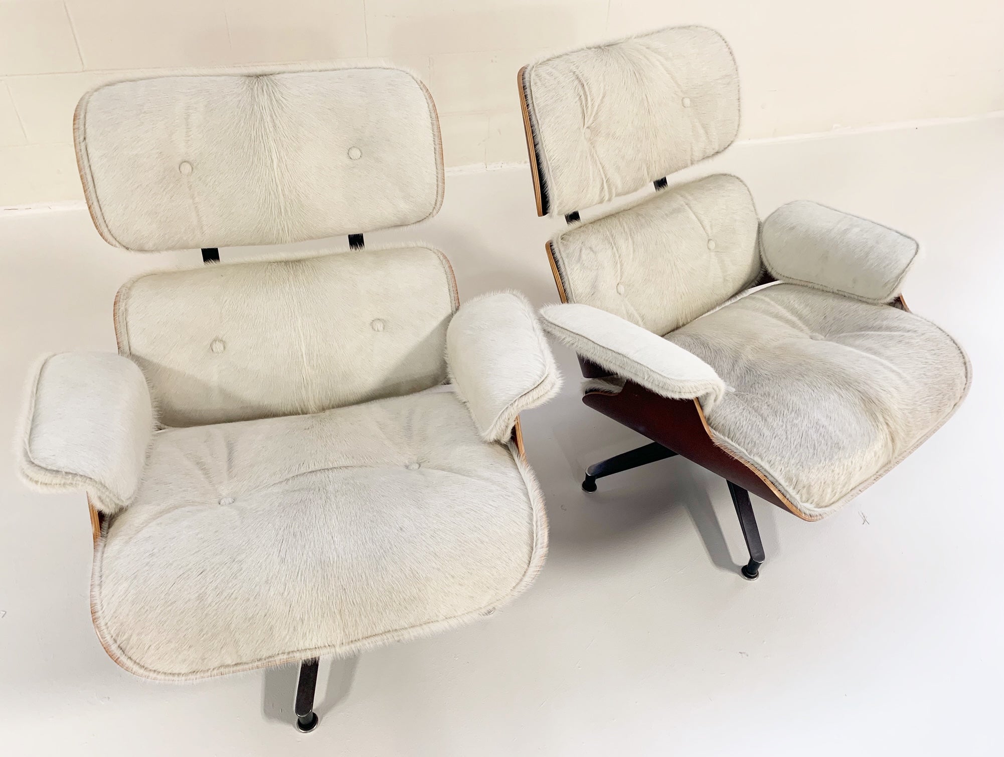 670 Lounge Chairs and 671 Ottomans in Brazilian Cowhide - FORSYTH