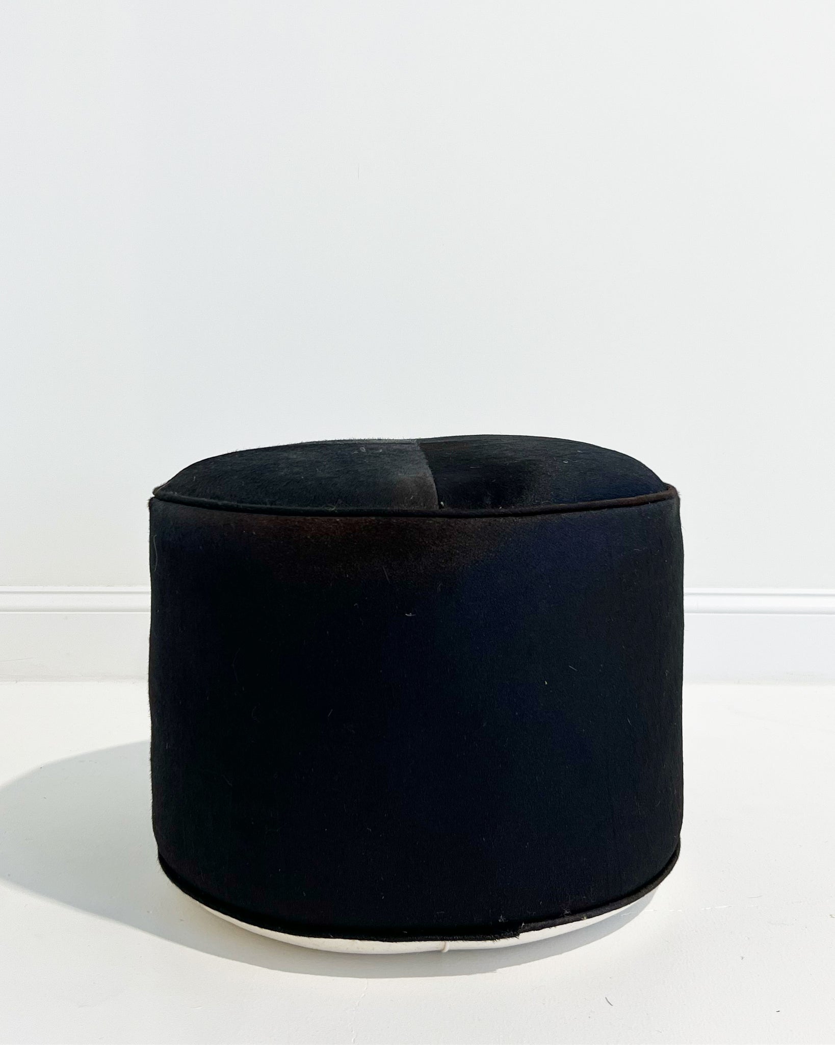 The Forsyth Pouf Ottoman in Black Cowhide 01